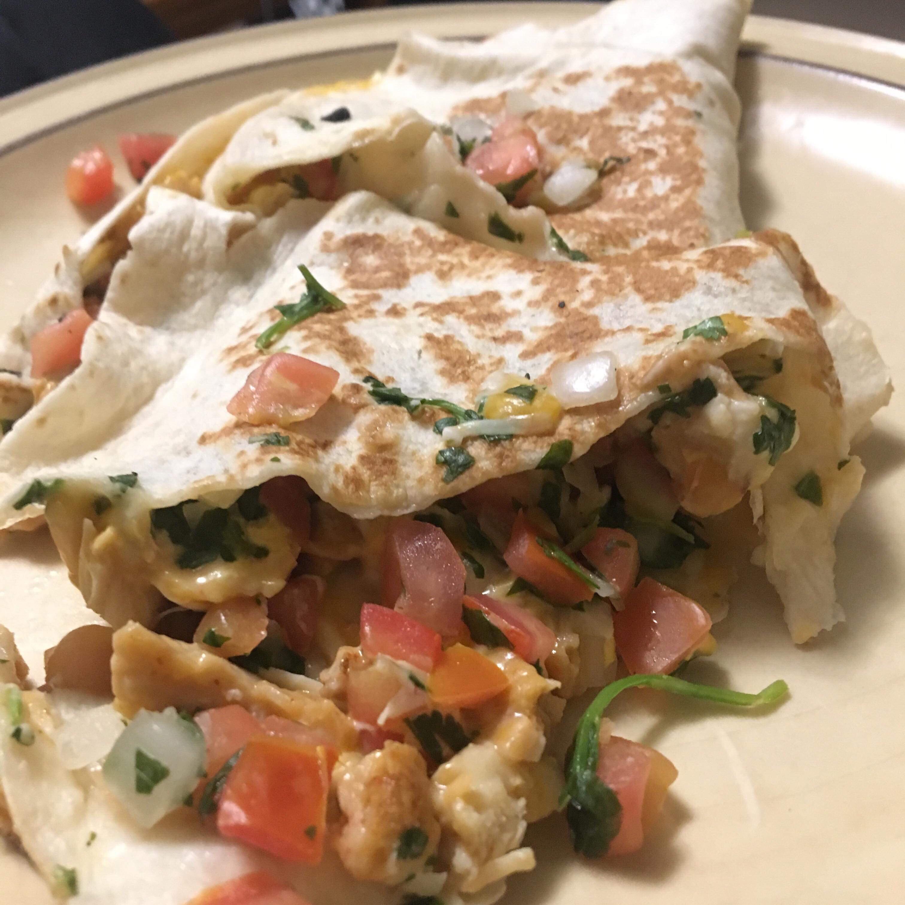 Taco Bell chicken quesadilla with pico. Was delicious! r/shittyfoodporn