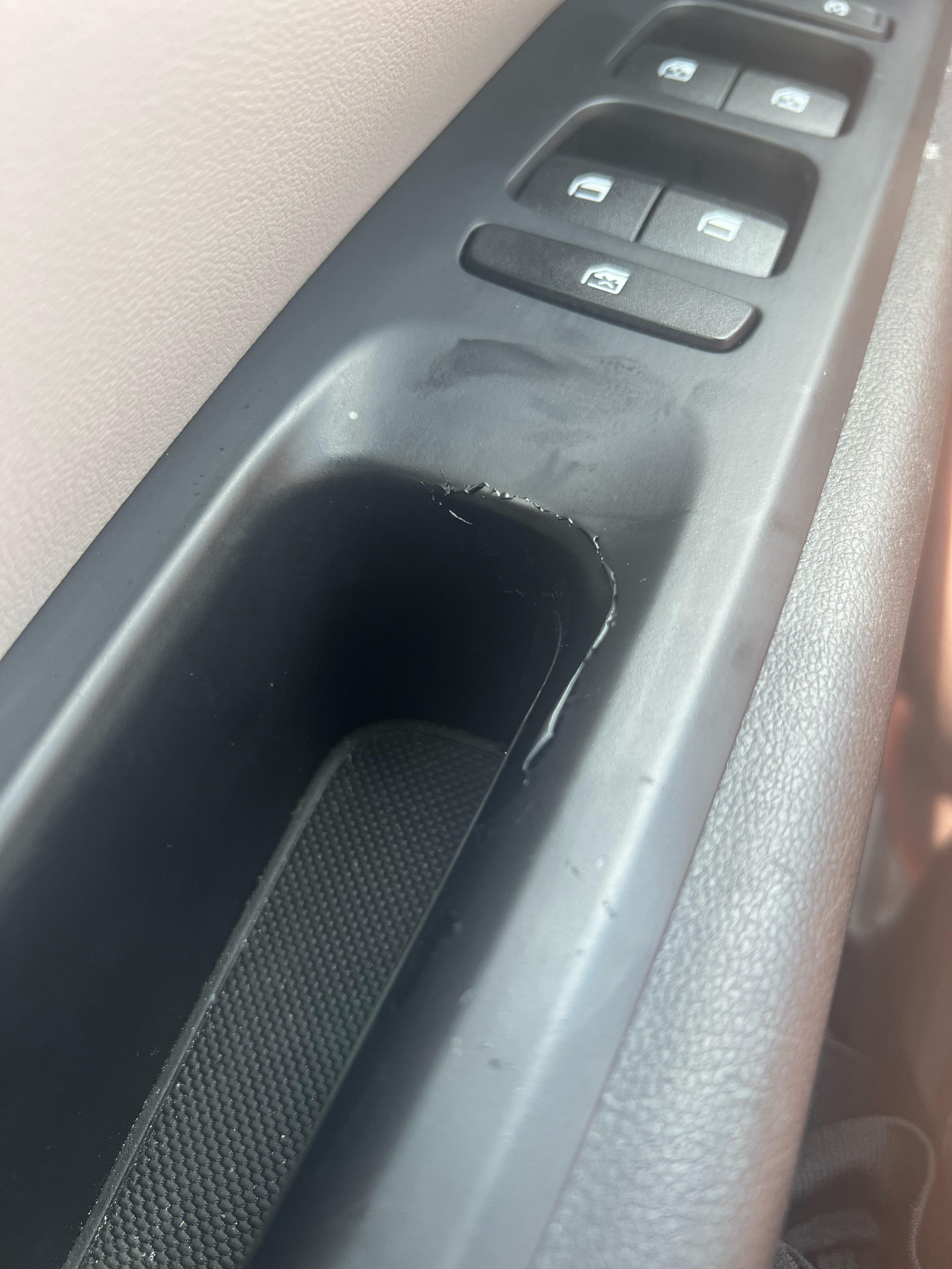 Peeling armrest on 2022 Tucson. Anyone else have this issue? It’s happening on both front doors