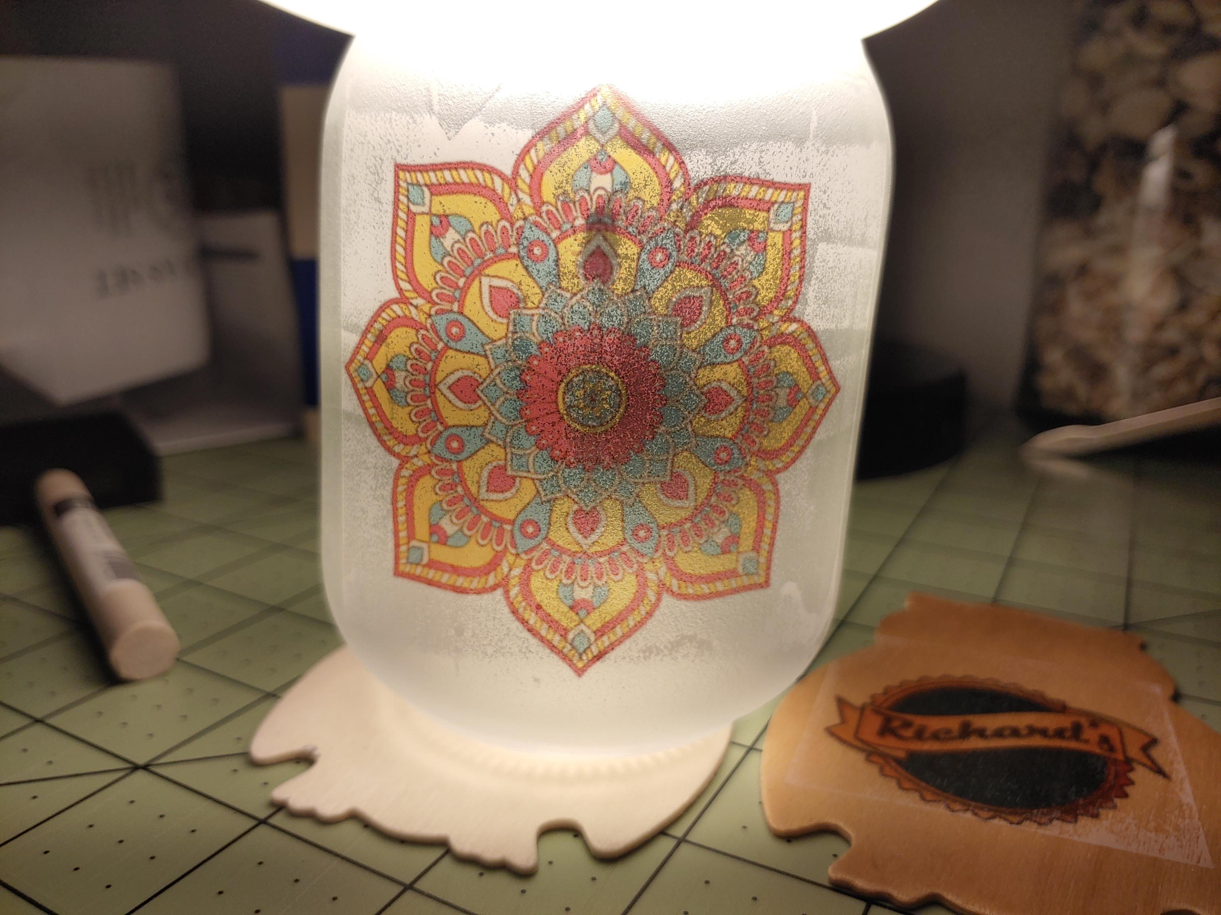 First attempt to sublimate onto glass. Etched with my sandblaster then