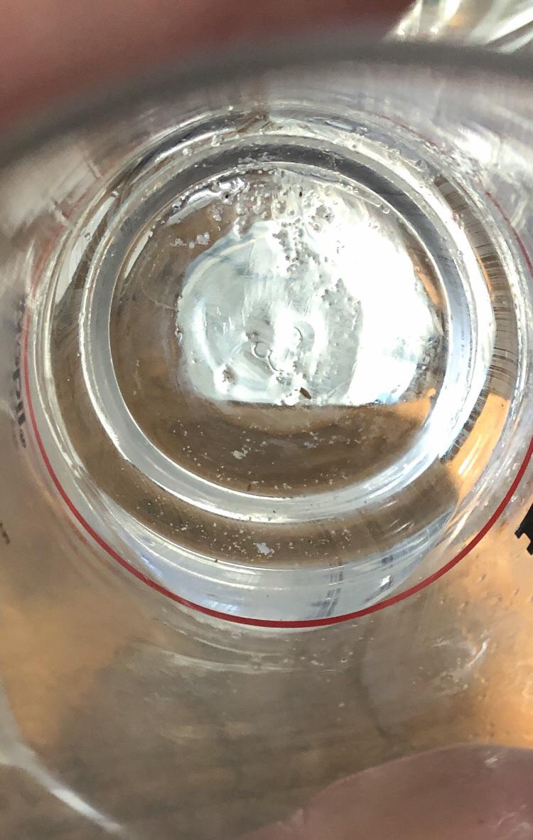 “Sandy” looking particles showing up in my drinking glasses r