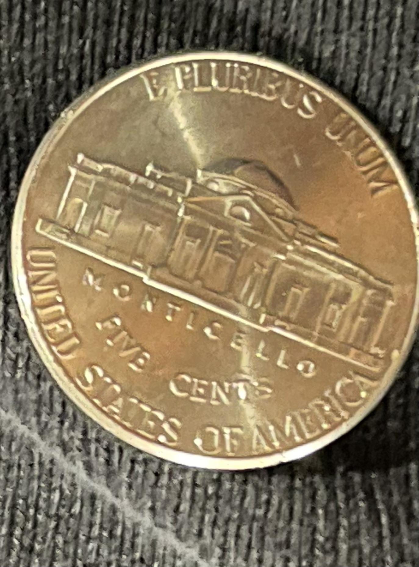 I found a Nickel on the sidewalk at the gas station. I named it Philip