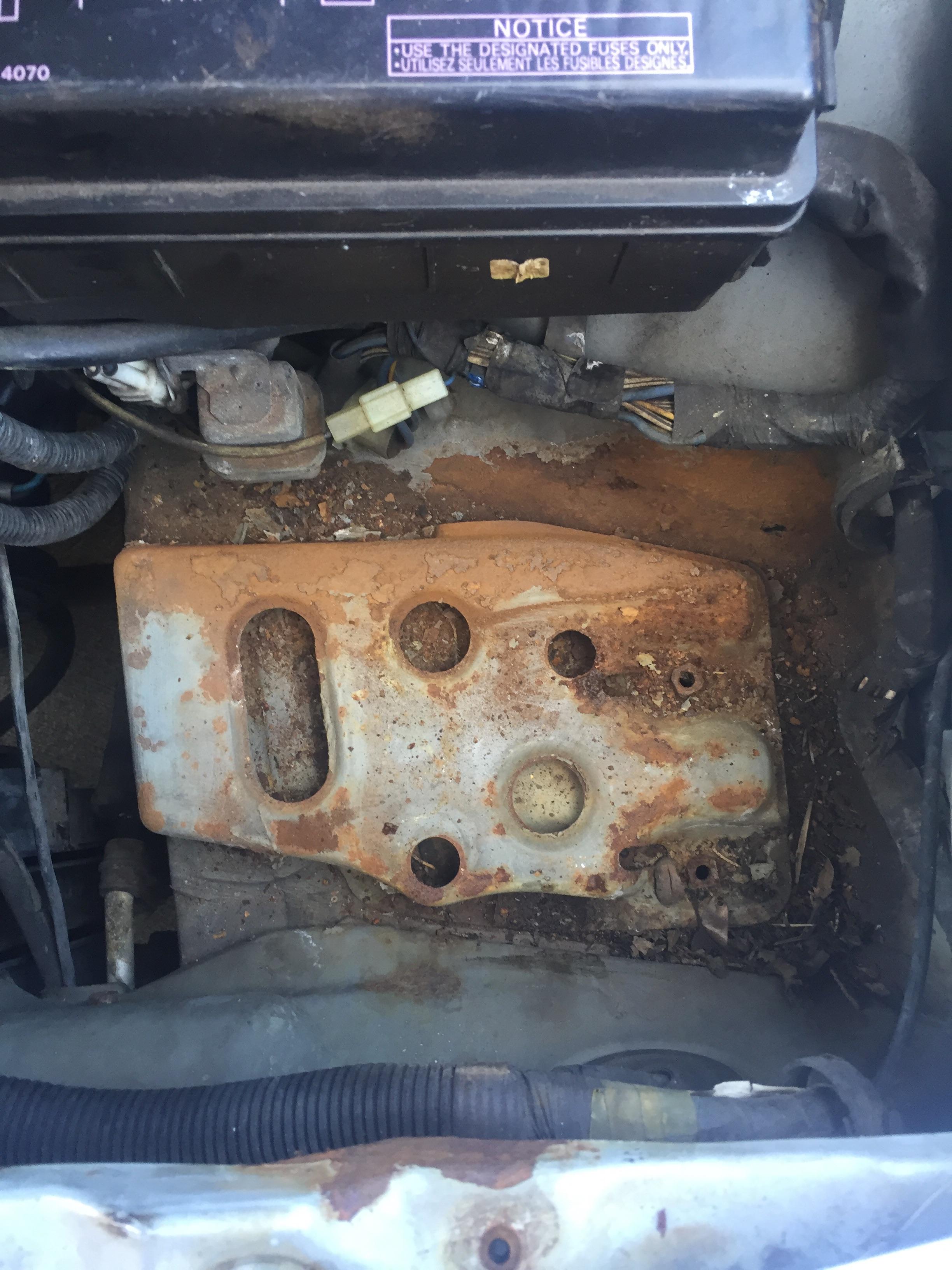 Any tips on cleaning this battery tray? It’s welded to the body and it