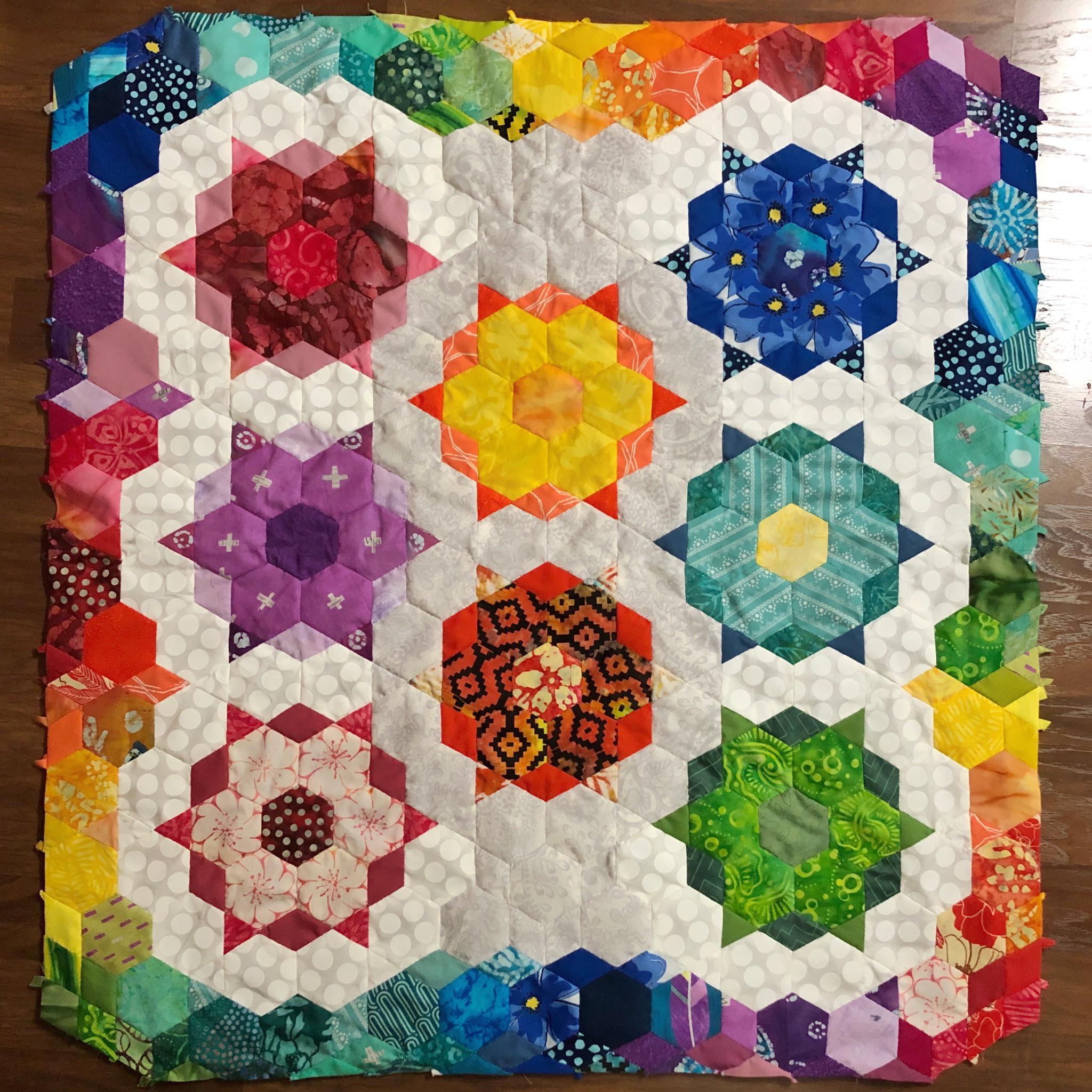 Finished my first EPP quilt top and SO happy with how it turned out! Scrappy rainbow quilts 4