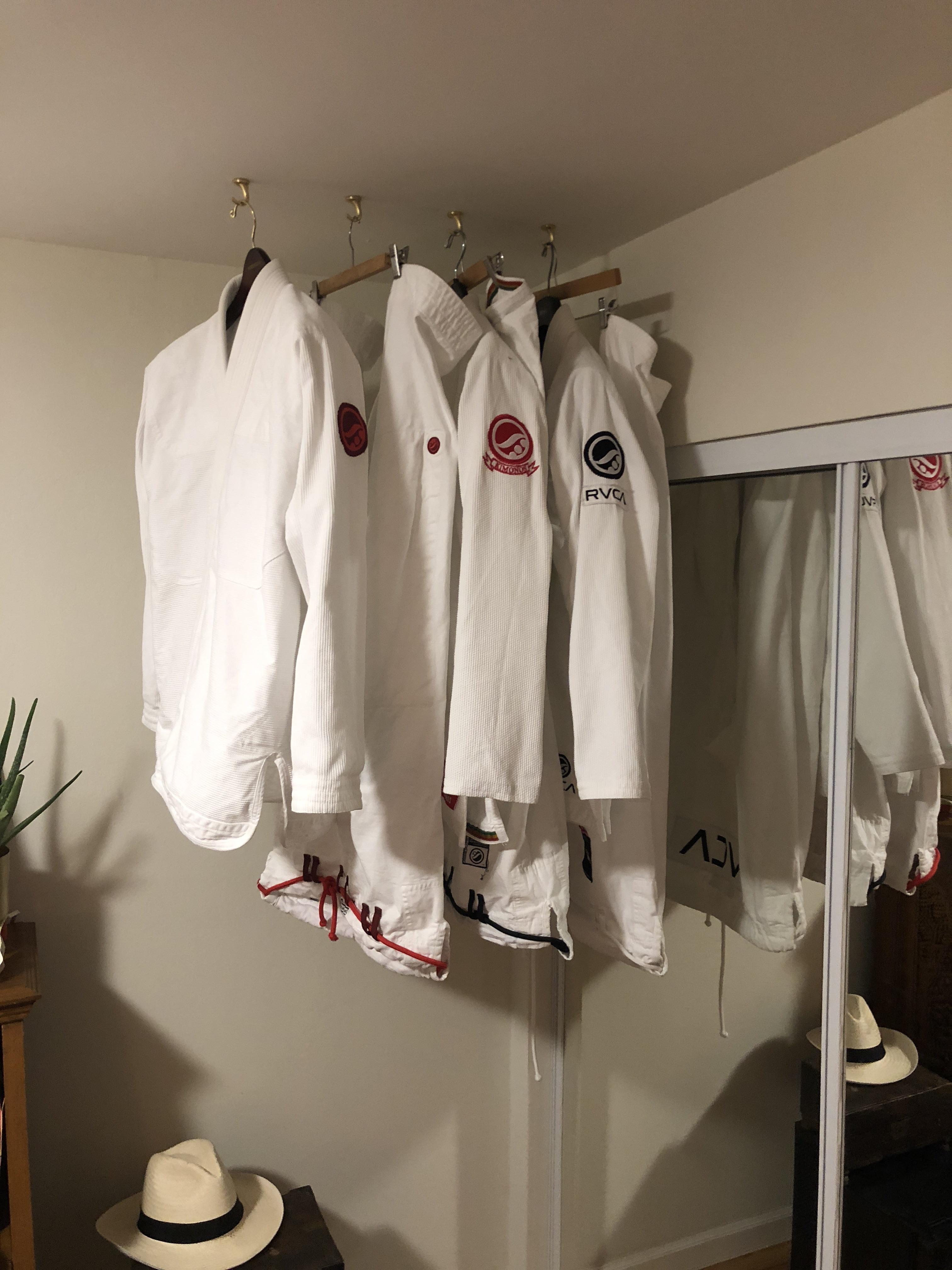 Gi storage/drying suggestions? Wife is sideeyeing my setup r/bjj