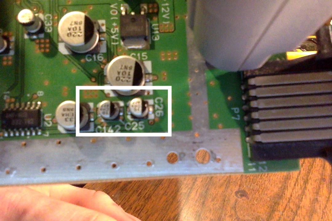 N64 I think I've located the cause of the no audio or video. Caps C26