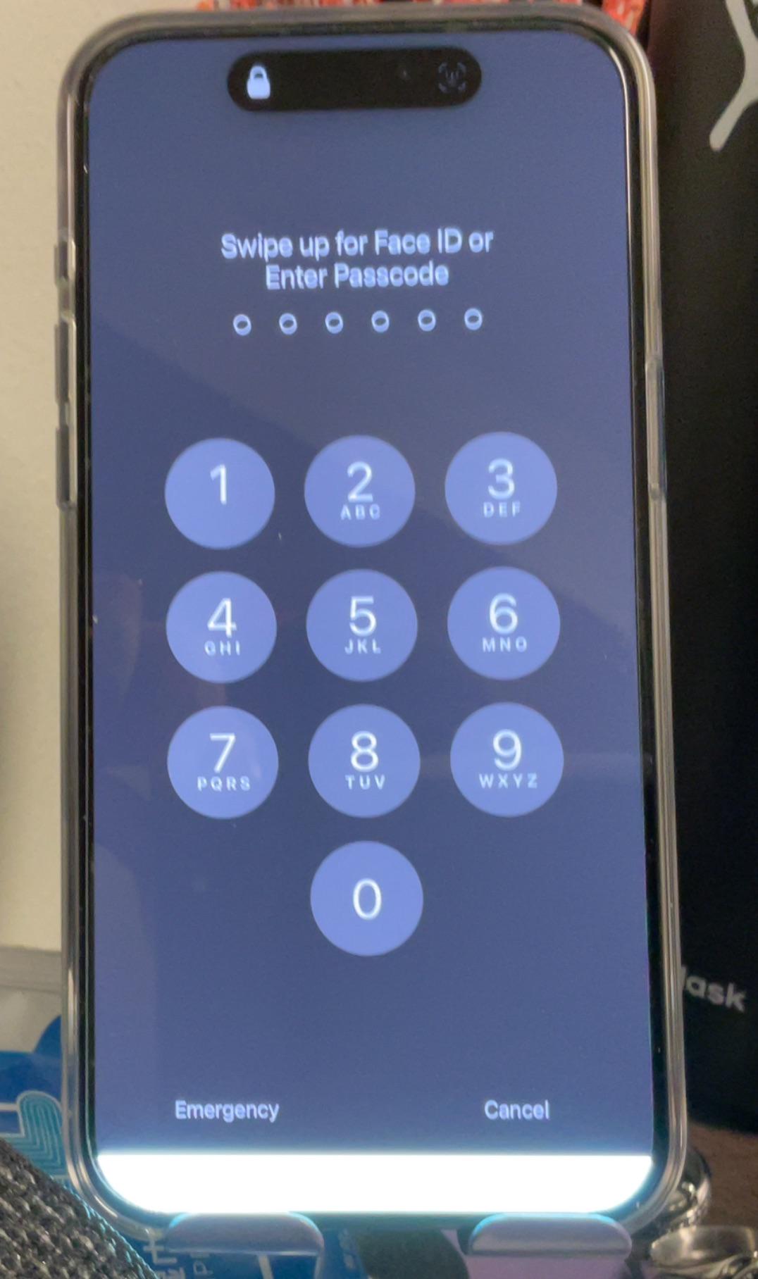 The bottom screen of my iPhone 15 pro max keeps flickering white light