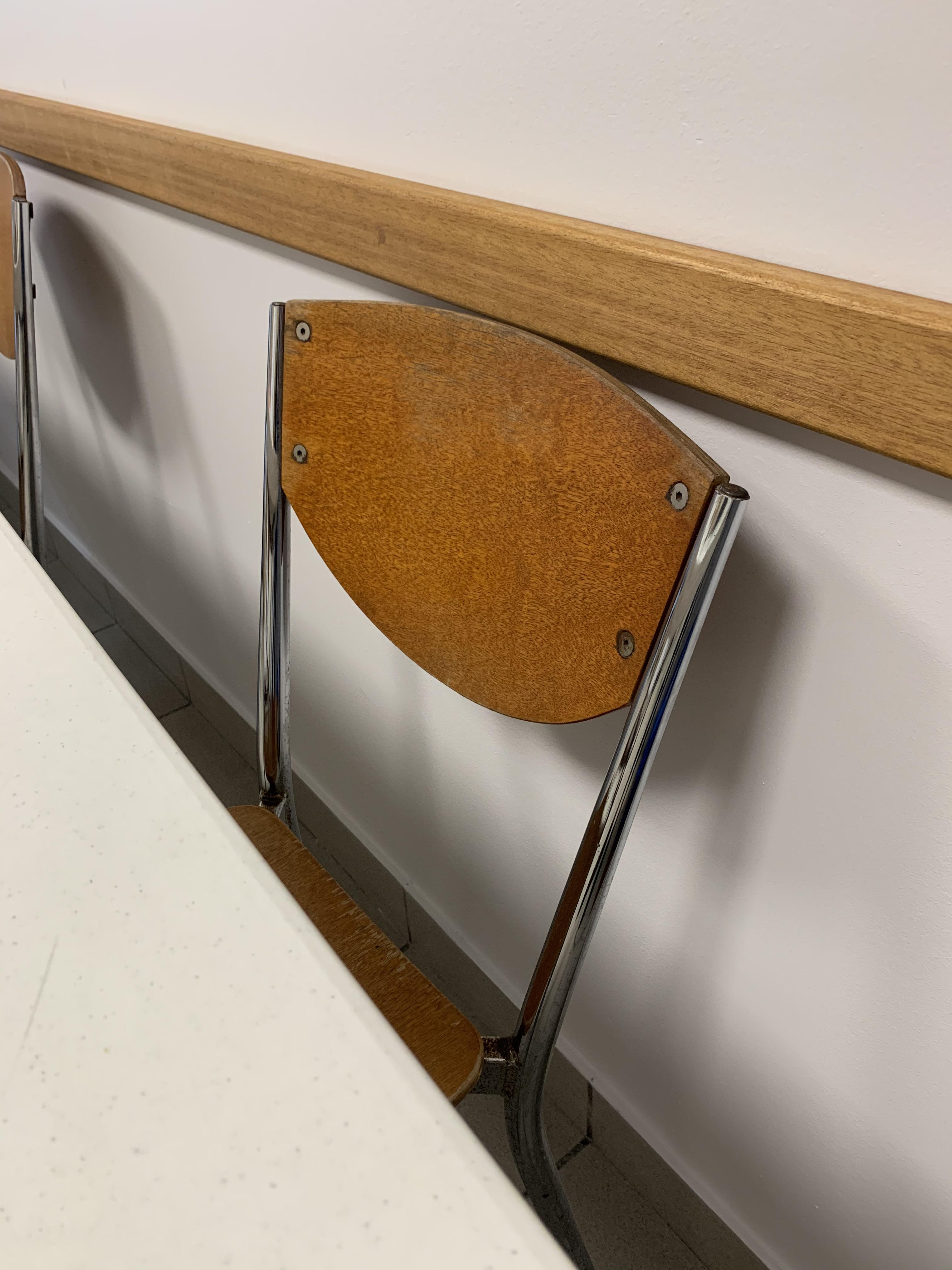 The sole purpose of the wooden slat on this white wall is to prevent