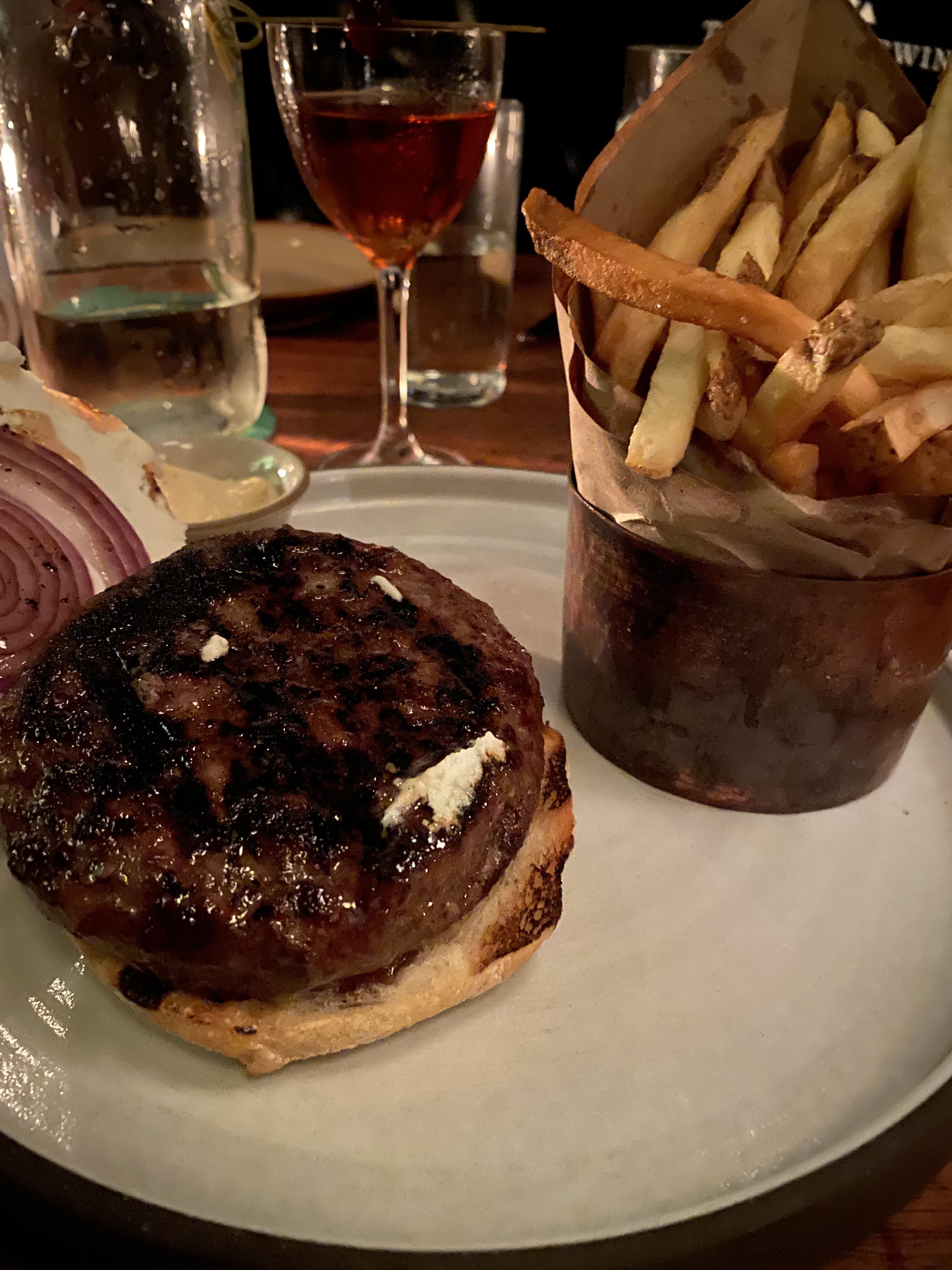 The char grilled lamb burger with twice cooked fries at The Breslin