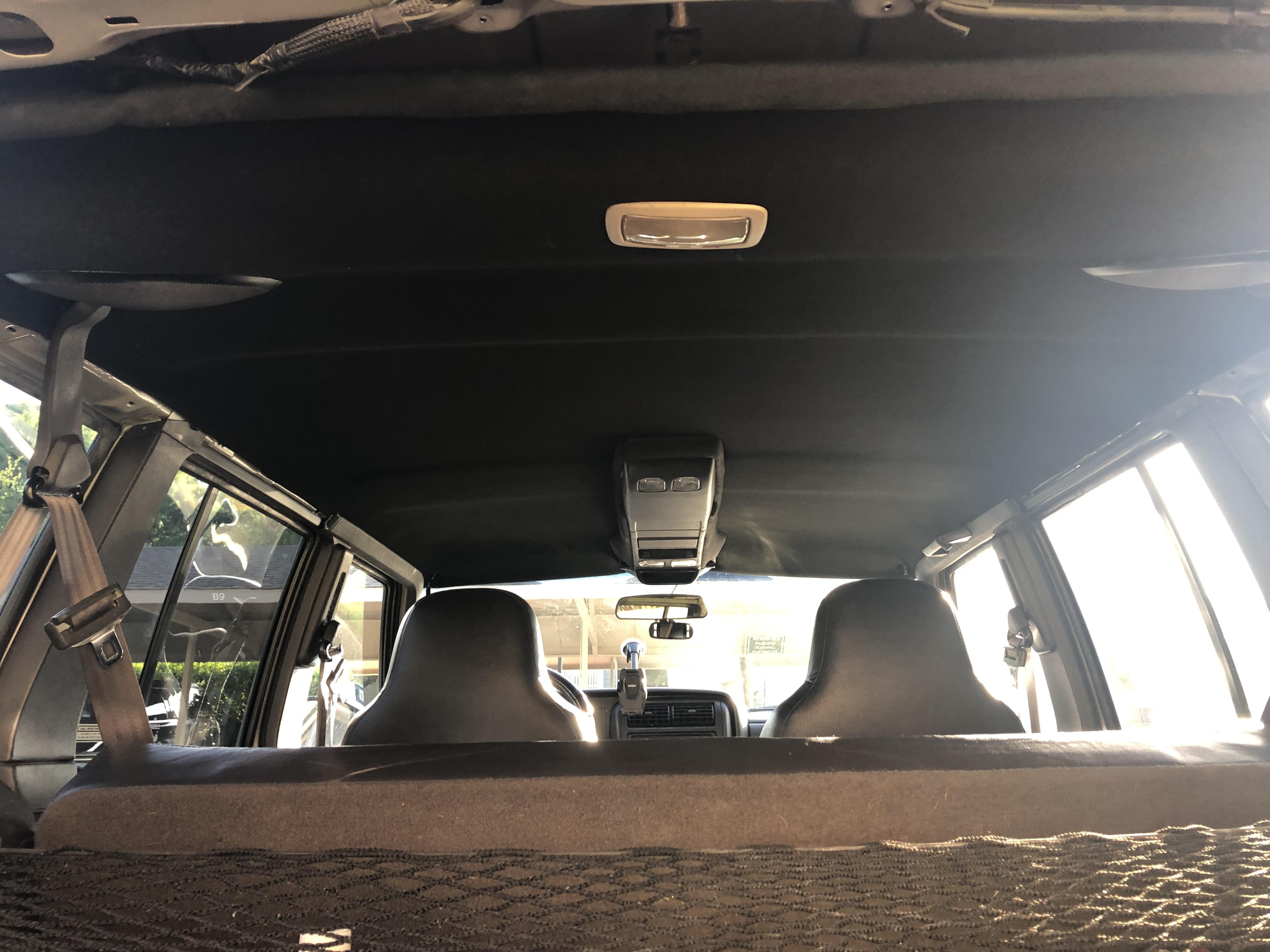 Black headliner done. Not bad. Rear light still needs painting. PITA