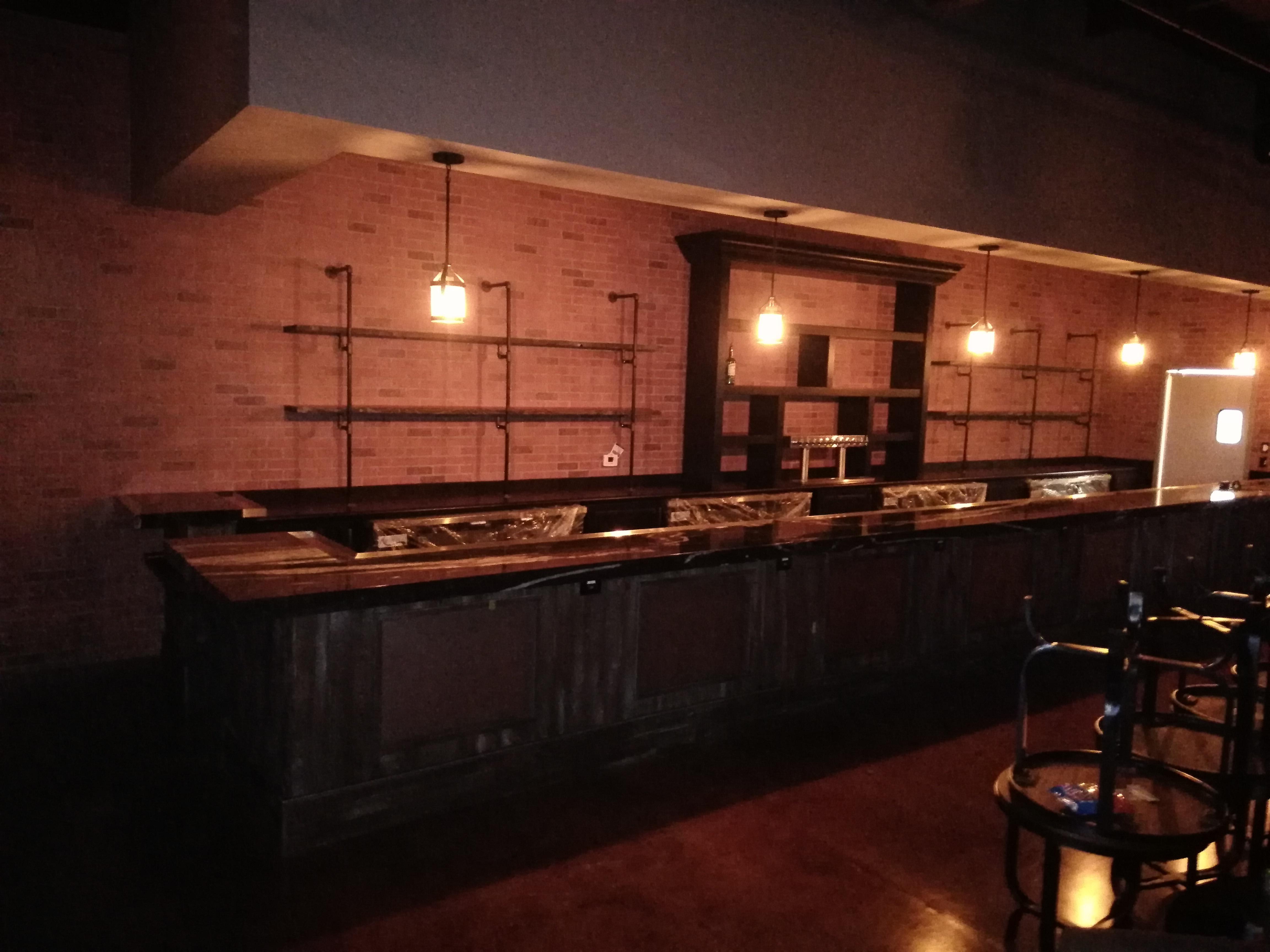 Woodworking Hub Bar I designed and built. Going for a speakeasy style bar