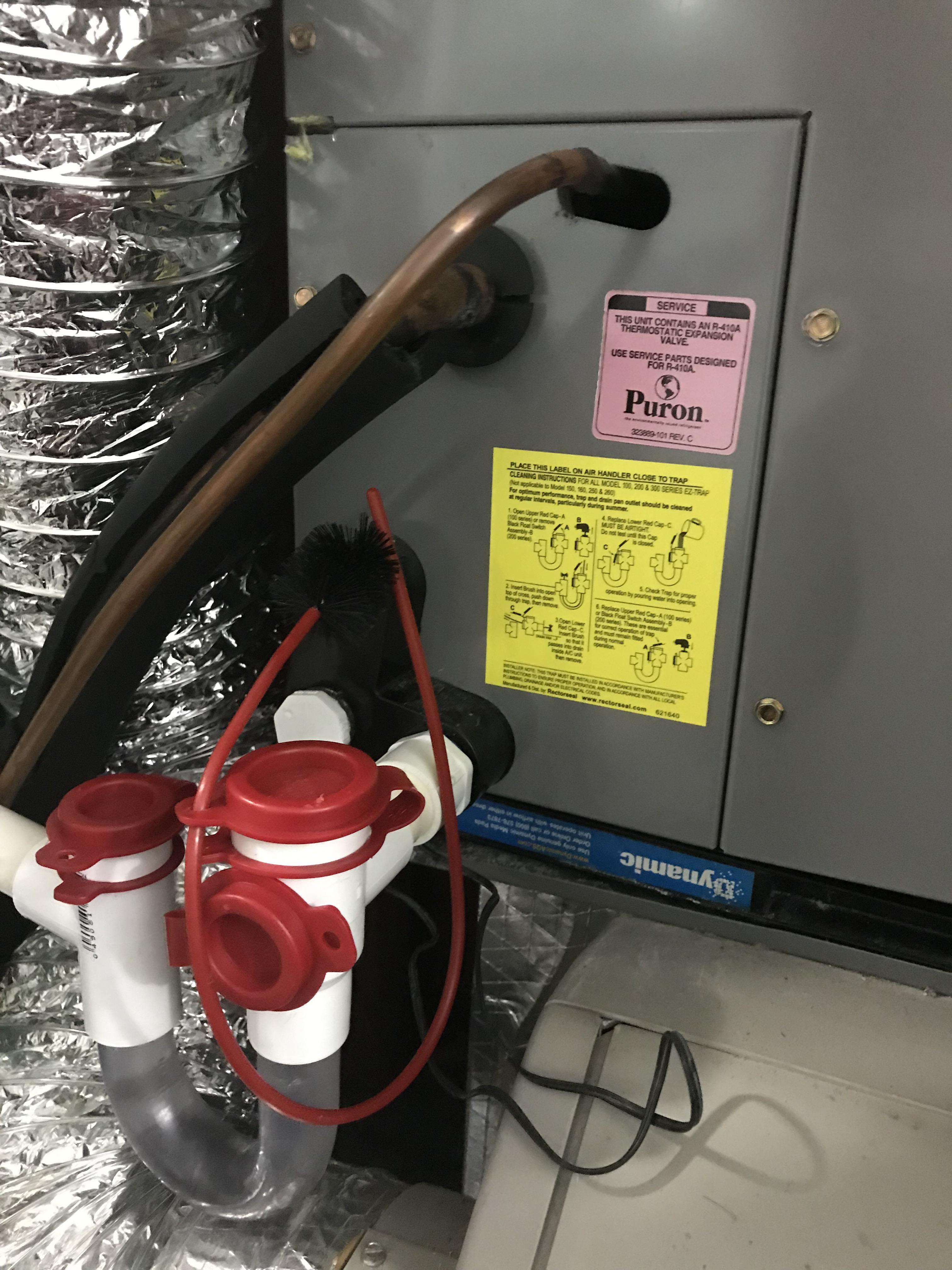 Help! We need to change our filter but the EZ trap is blocking it. It