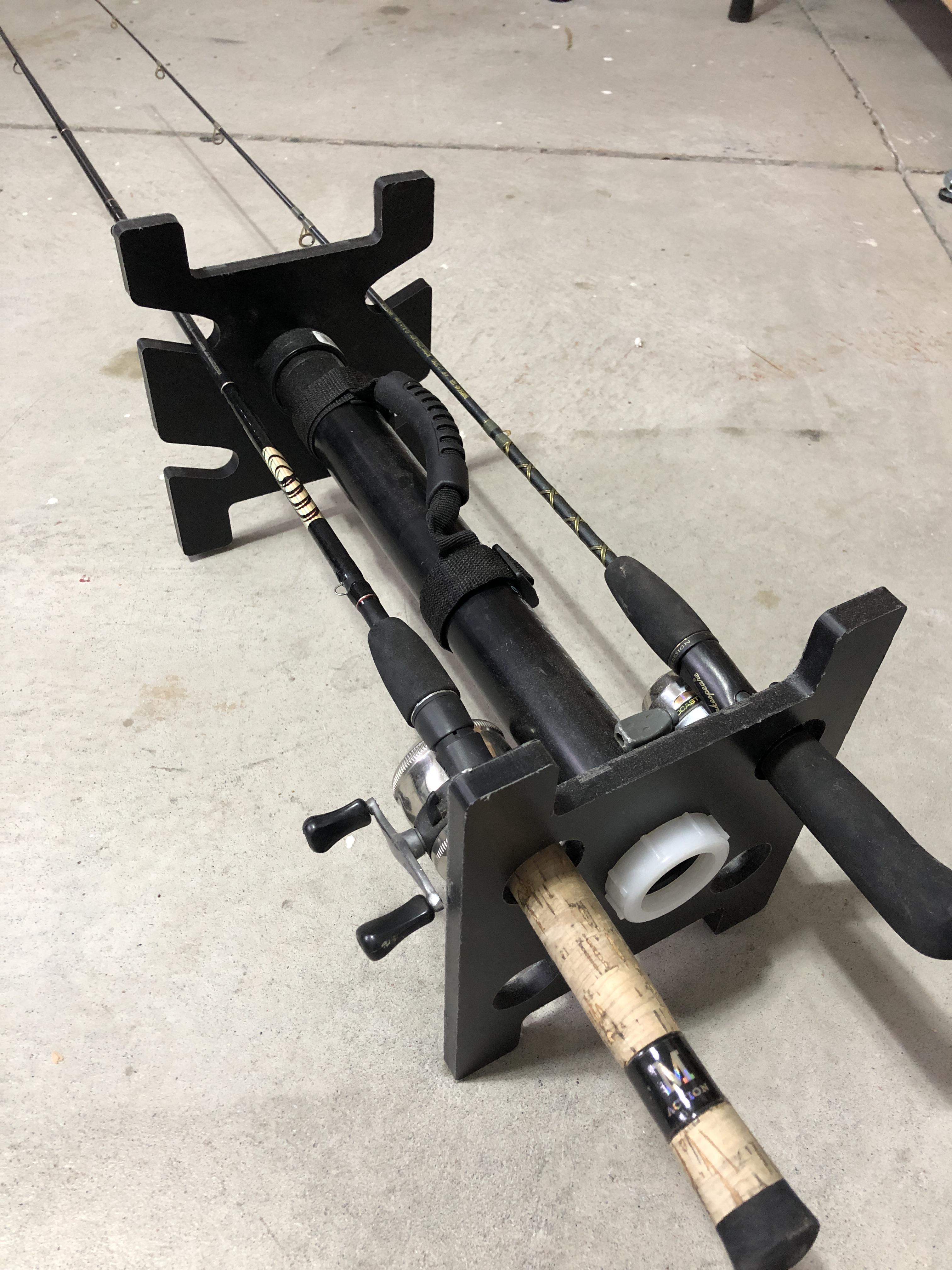 4 fishing pole carrier. Made from 2 large cutting boards and abs pie and fittings. Works with