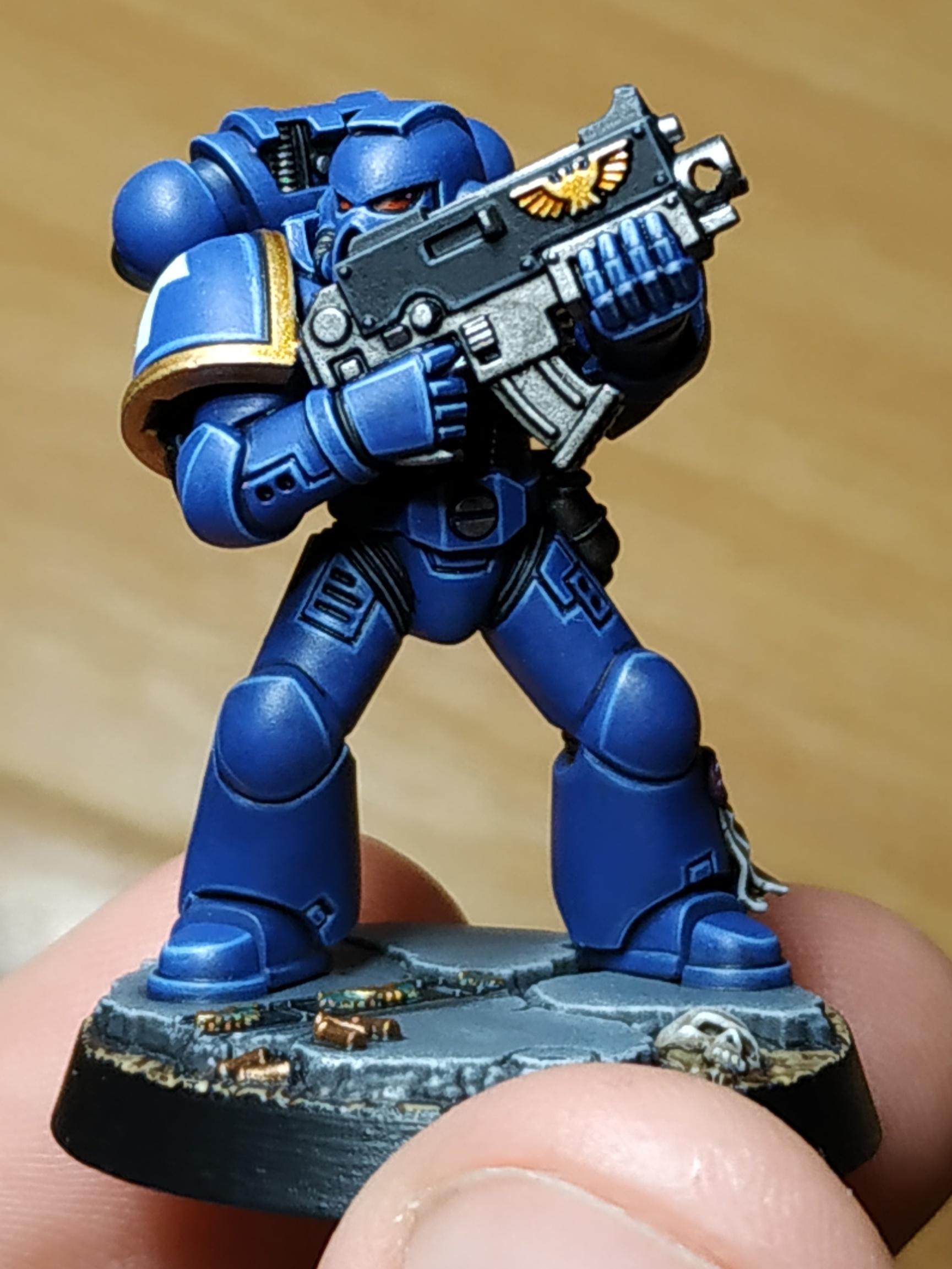Brother Castor of the Ultramarines. Tried to replicate the Eavy Metal