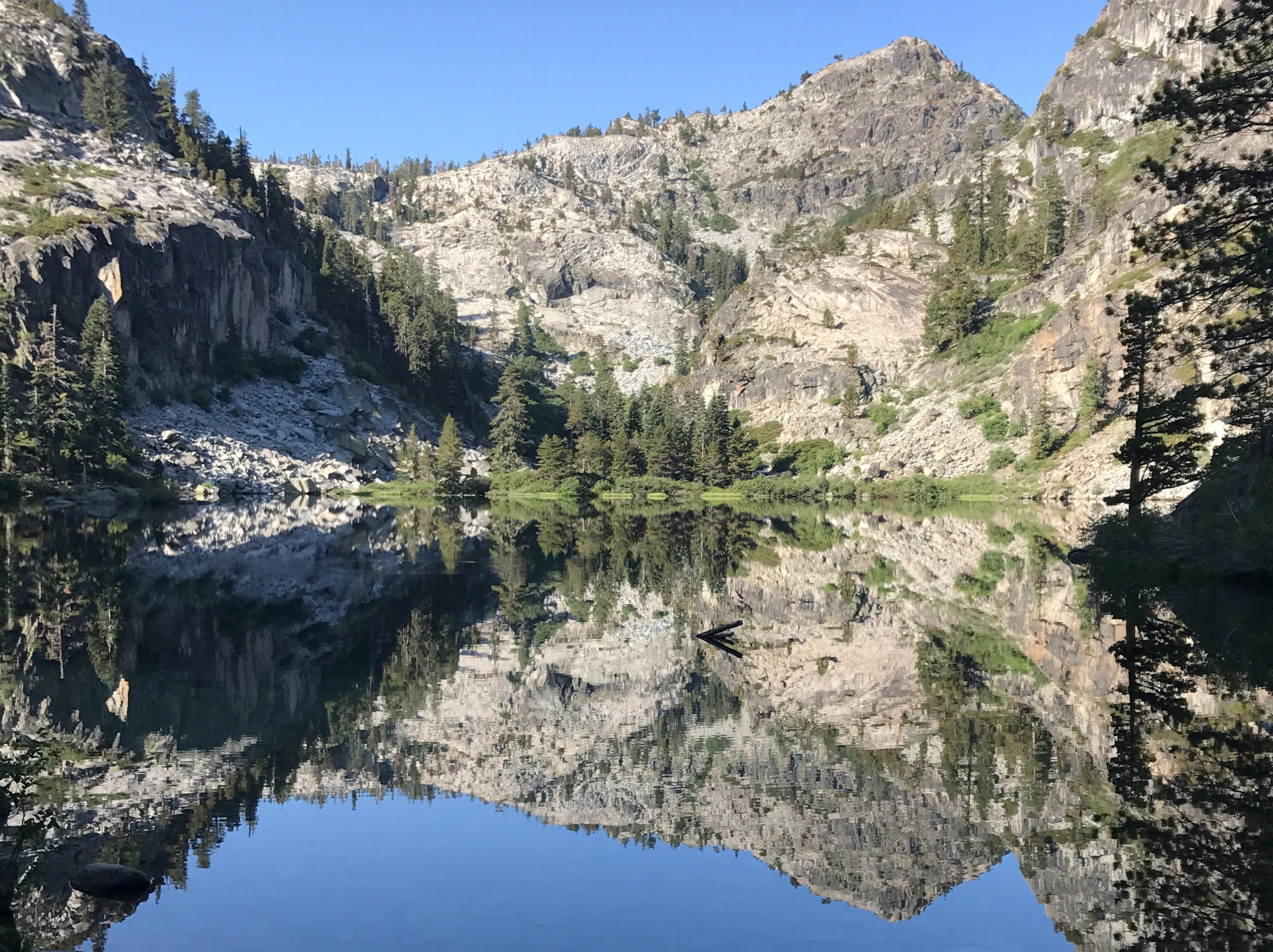 Perfectly mirrored mountains on Eagle Lake, Ca r/natureporn