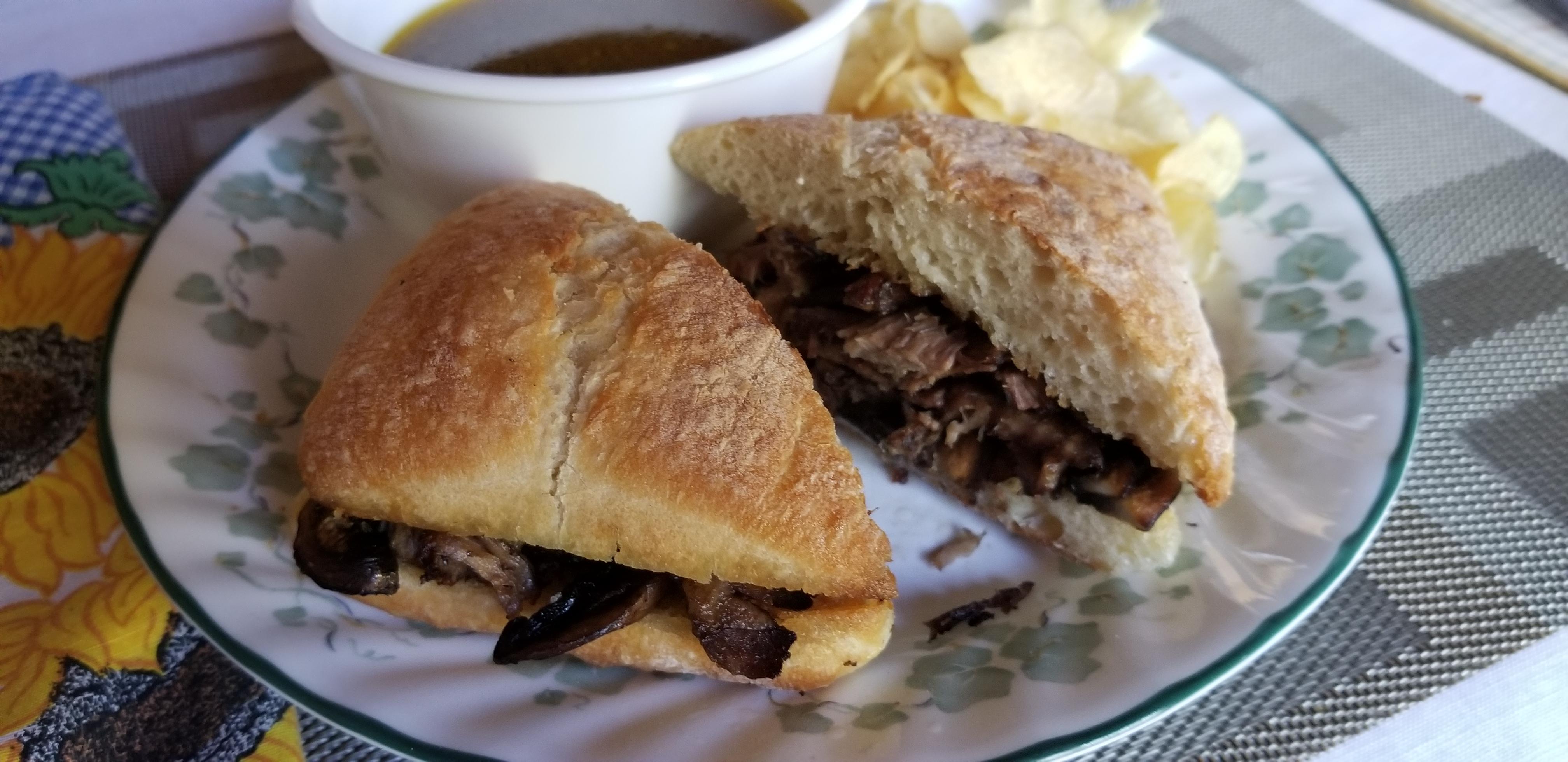 French dip with roasted mushrooms and slow braised beef chuck roast r