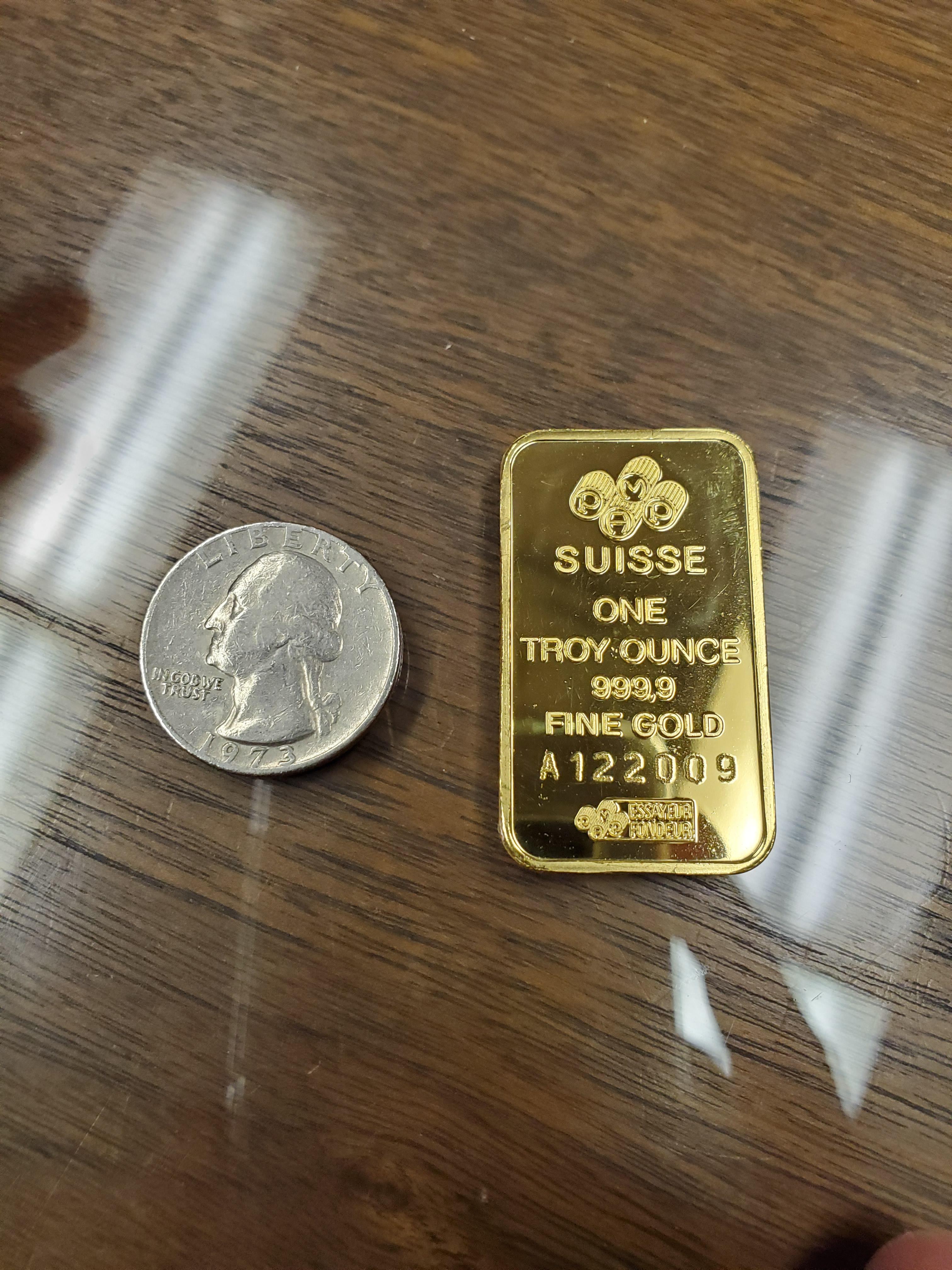 1500 USD of gold ( quarter for size ) r/mildlyinteresting