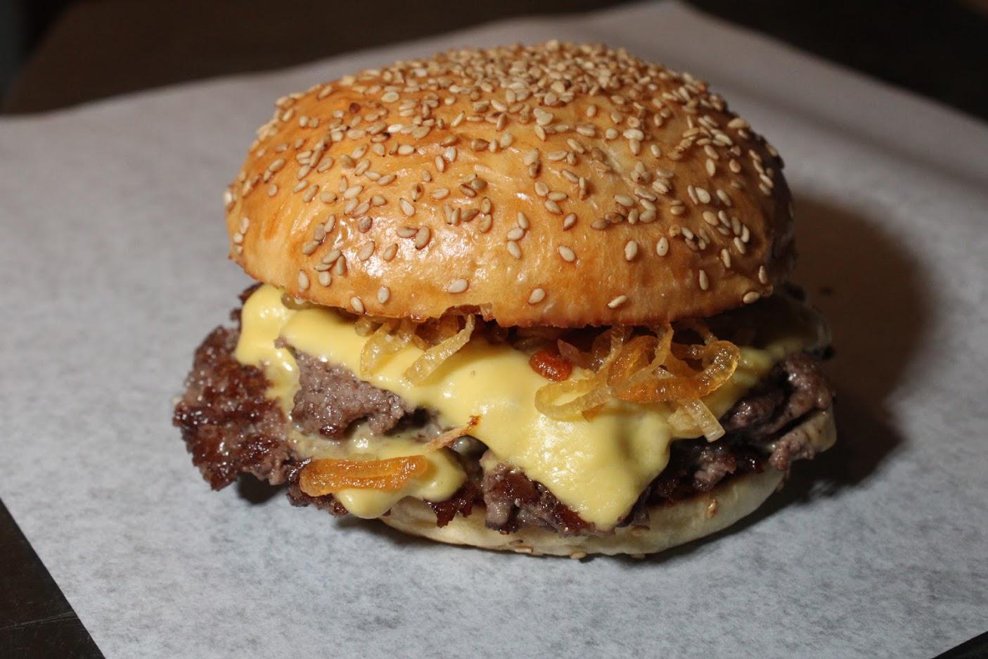 Here's my double smash burger with roasted garlic mayo, American cheese