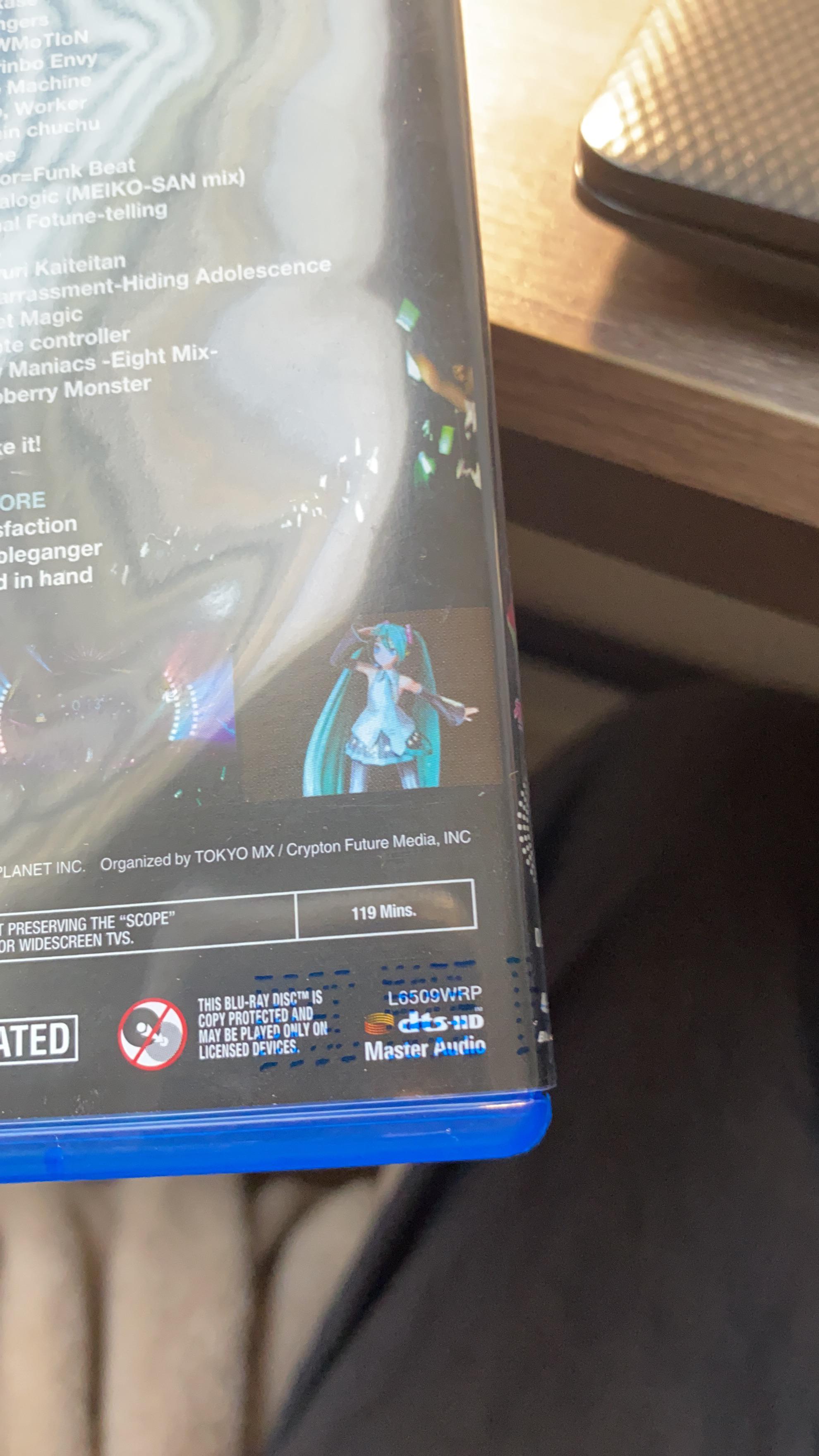 there’s morse code on the back of my magical mirai dvd. what does it