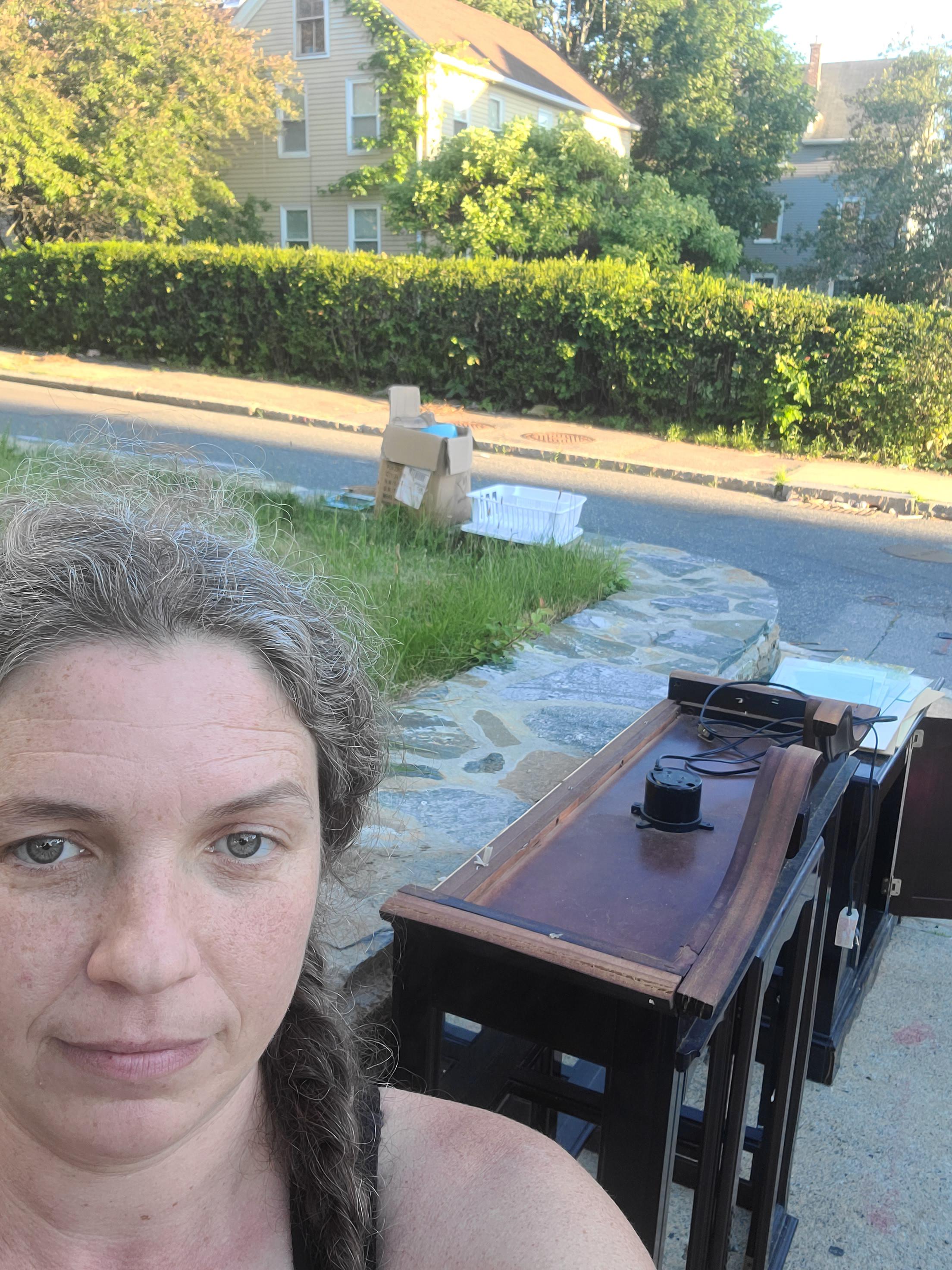 Guarding an armoire I found on the sidewalk til my friend with a truck arrives. The Soup N*zi is