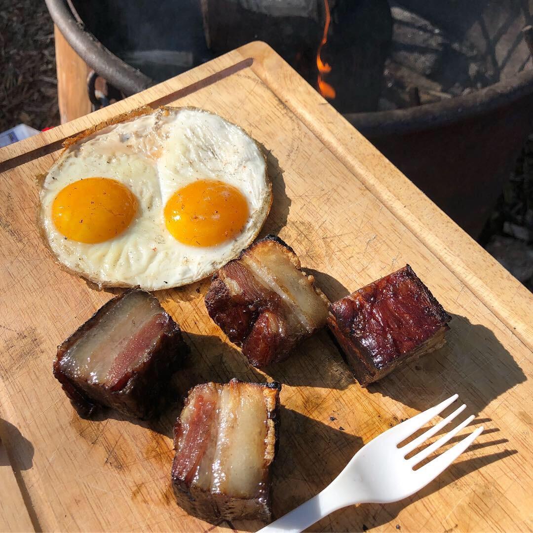 Pork belly and eggs for brunch! Over a fire we made ourselves. This is