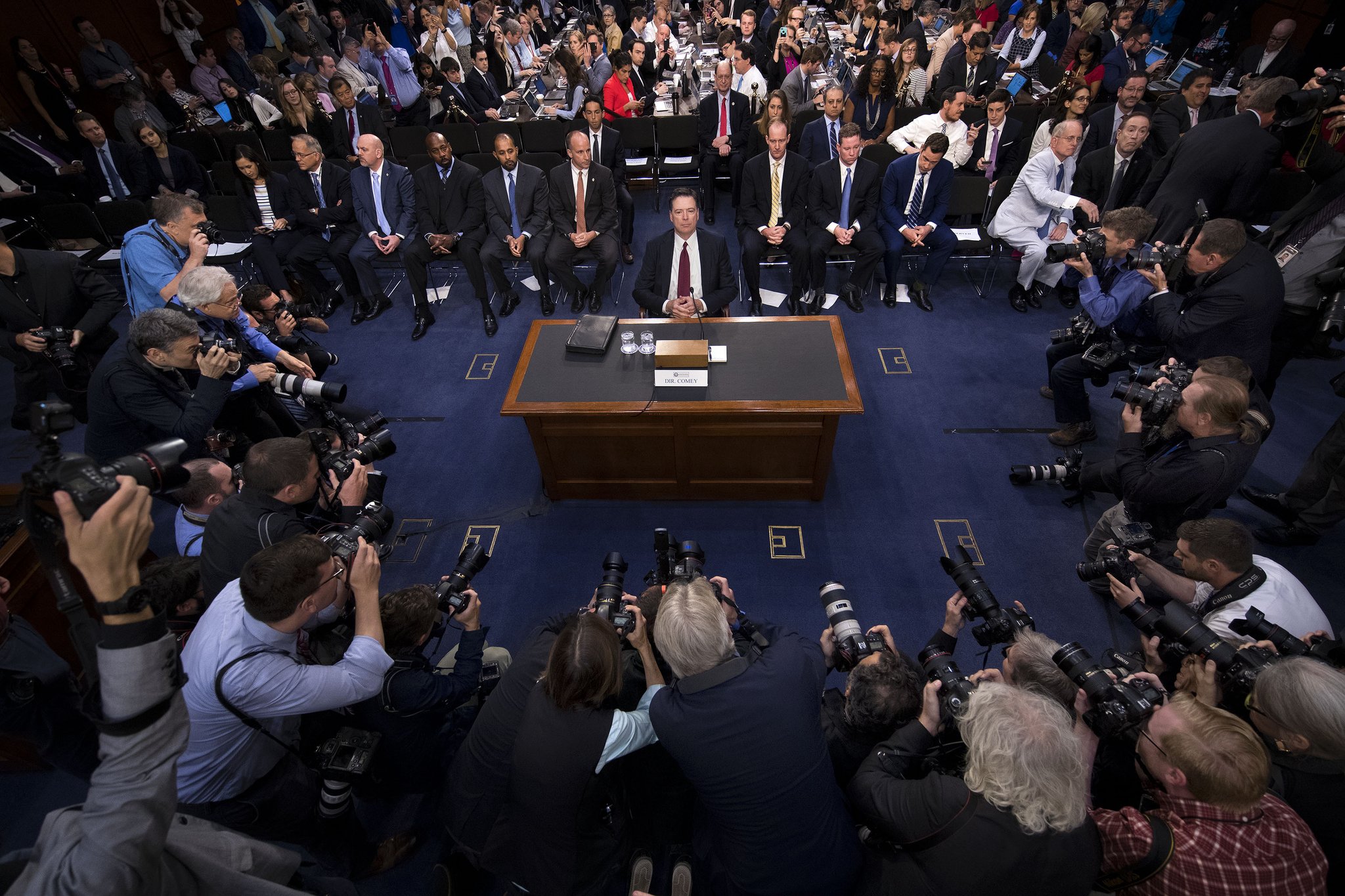 [Image] Former F.B.I. director James Comey takes his seat at the Senate