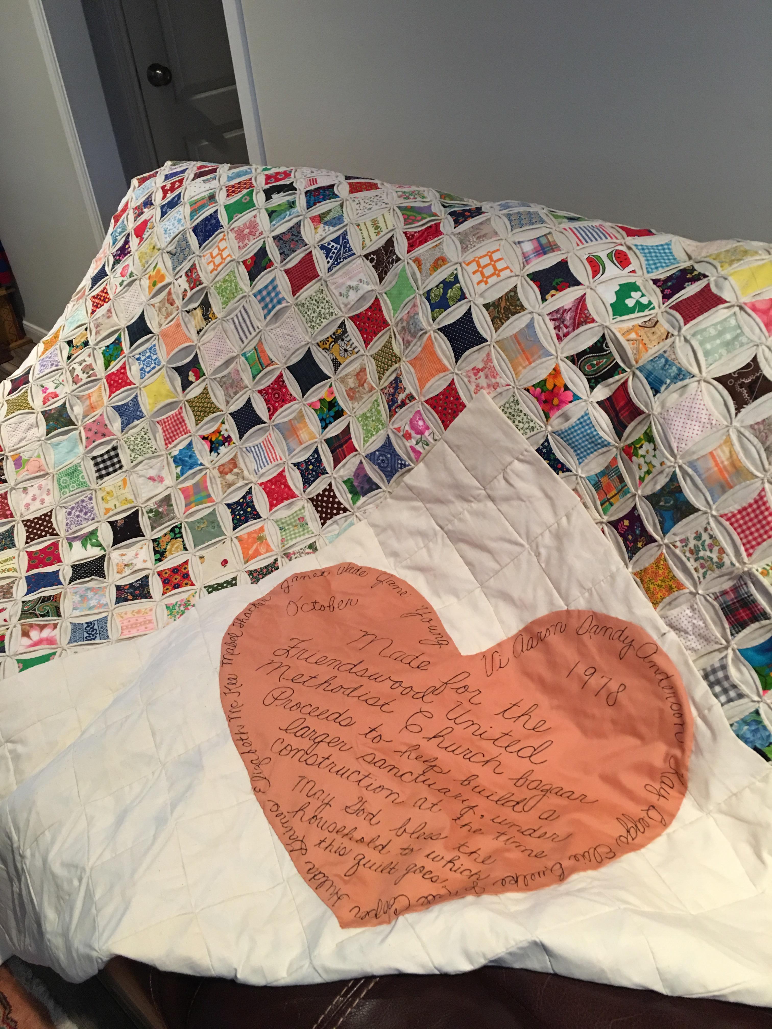 Look at this cathedral window quilt found at a church resale, restoring