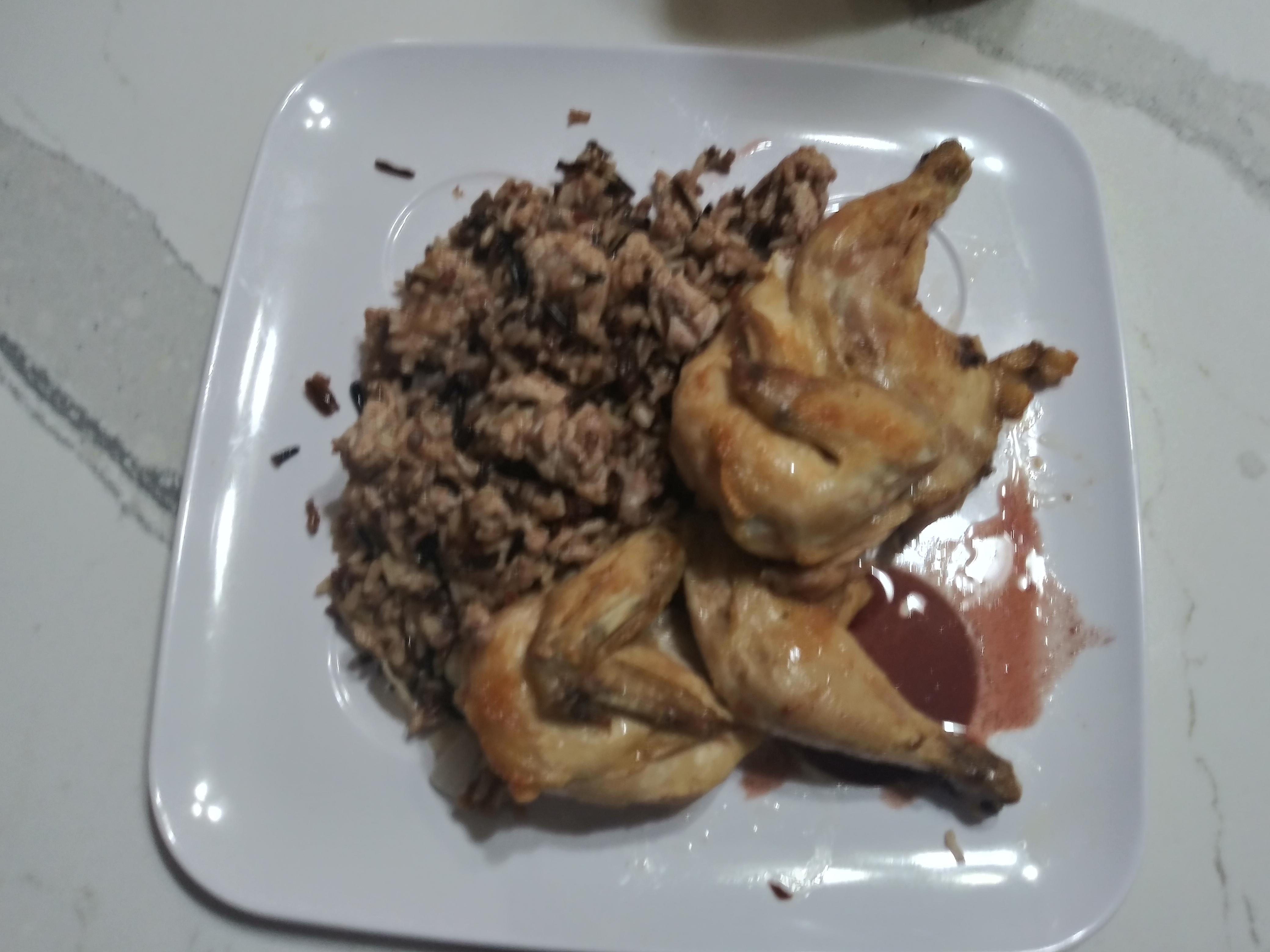 Cornish game hen with wild rice stuffing and pomegranate sauce r