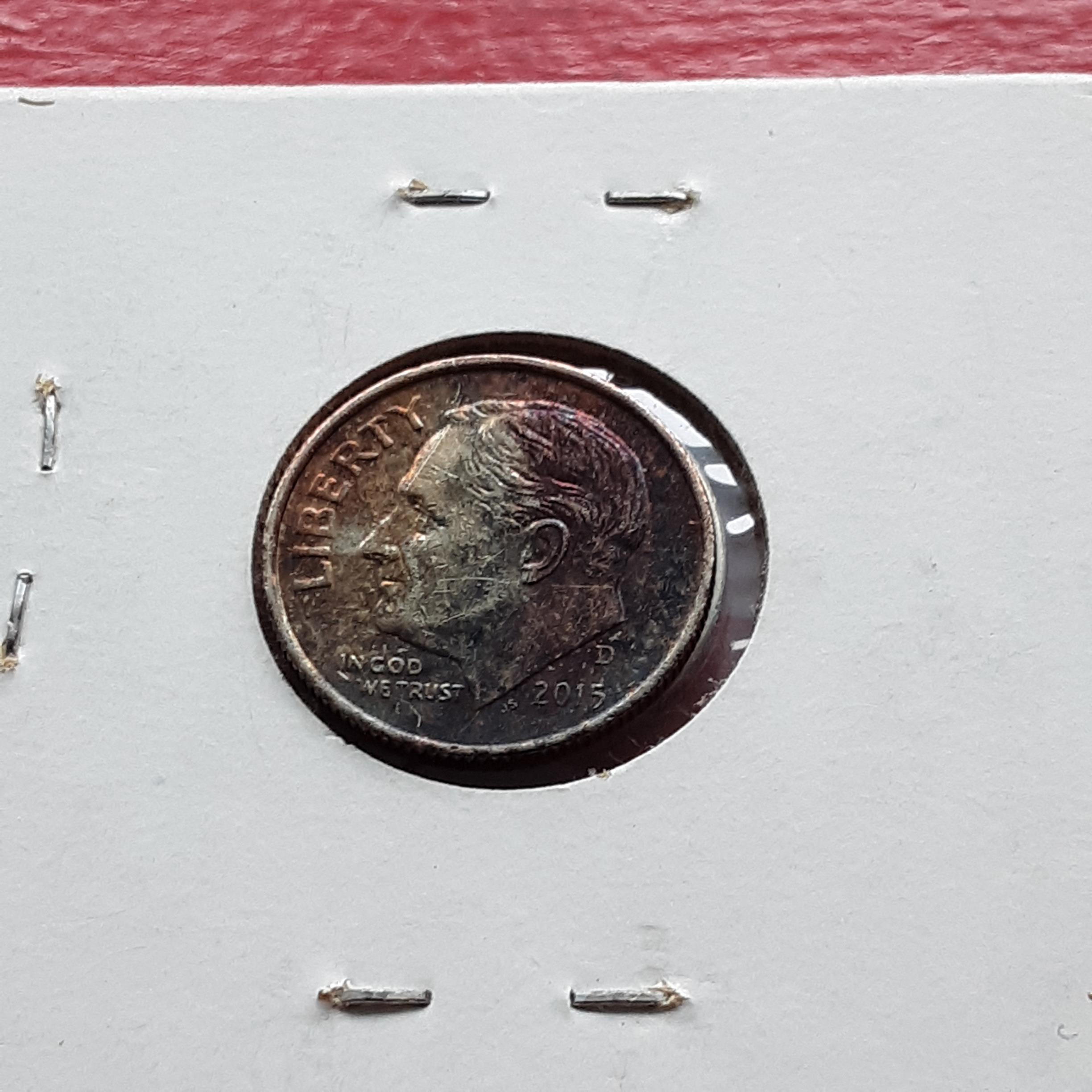 toned 2015 dime. hard to tell from this picture but it has some real