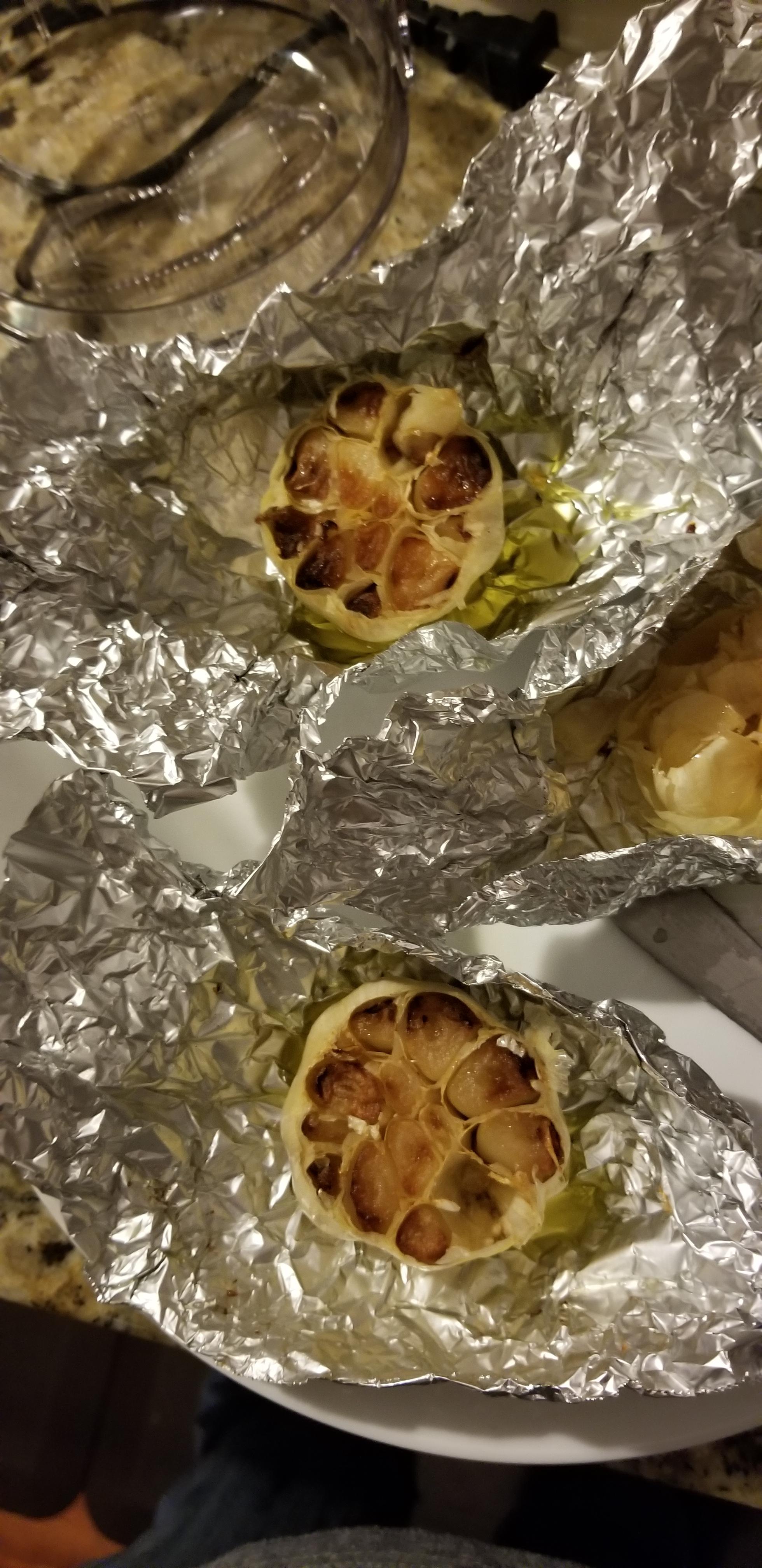 Air fryer roasted garlic! Cut off the top, drizzle in olive oil, and