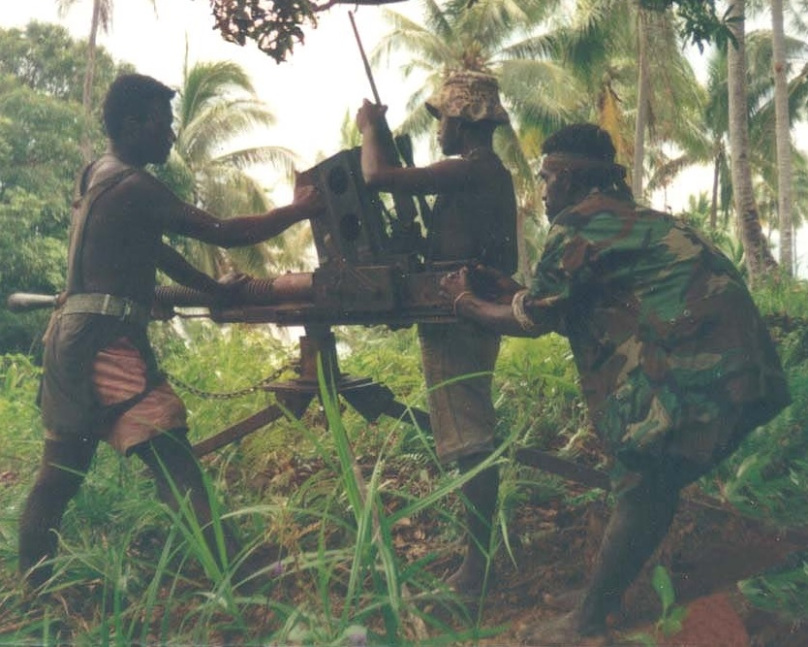 Bougainville Revolutionary Army fighters using a resurrected WW2