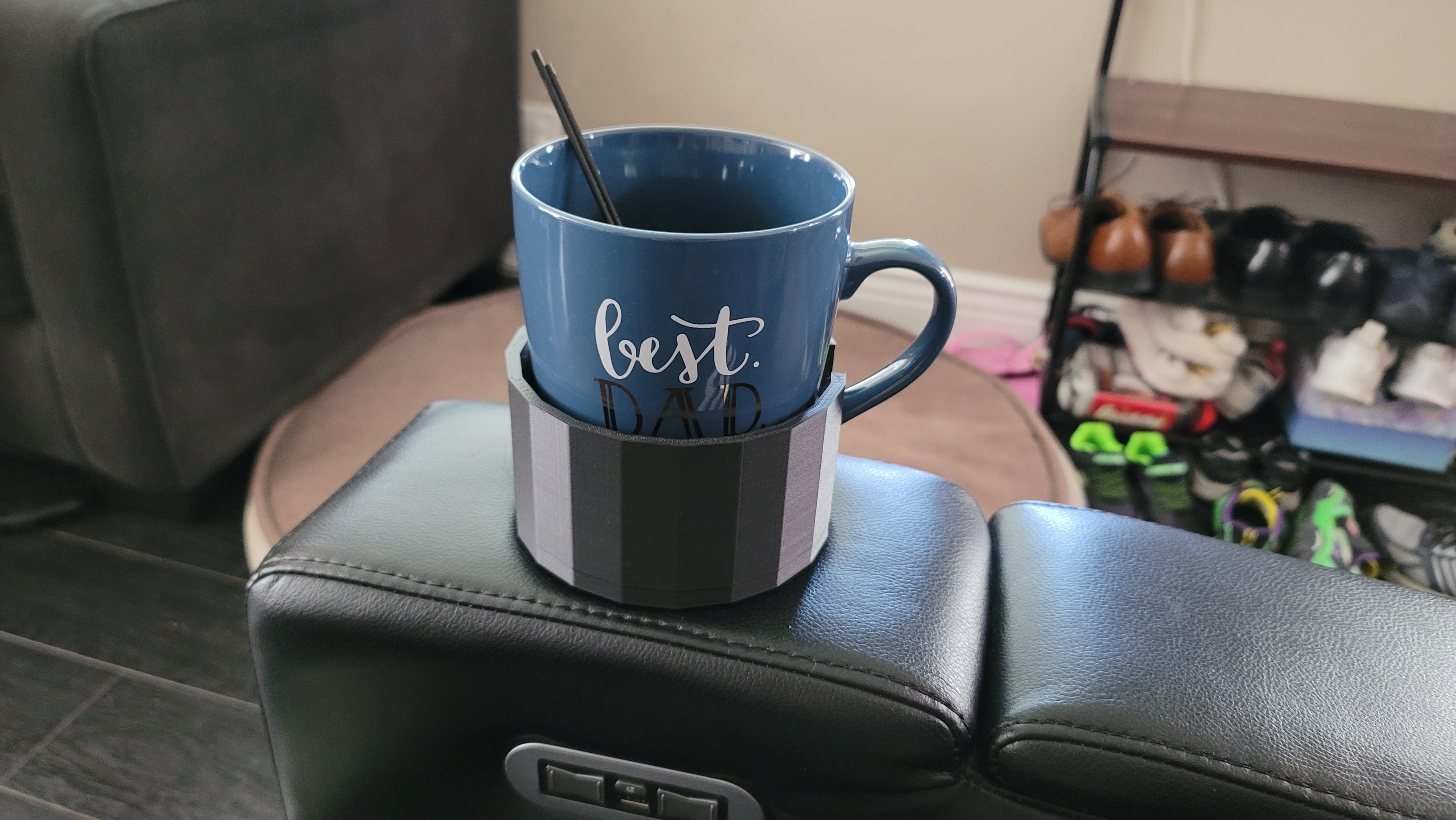 My coffee mug wouldn't fit in the cup holder in the armrest. So I