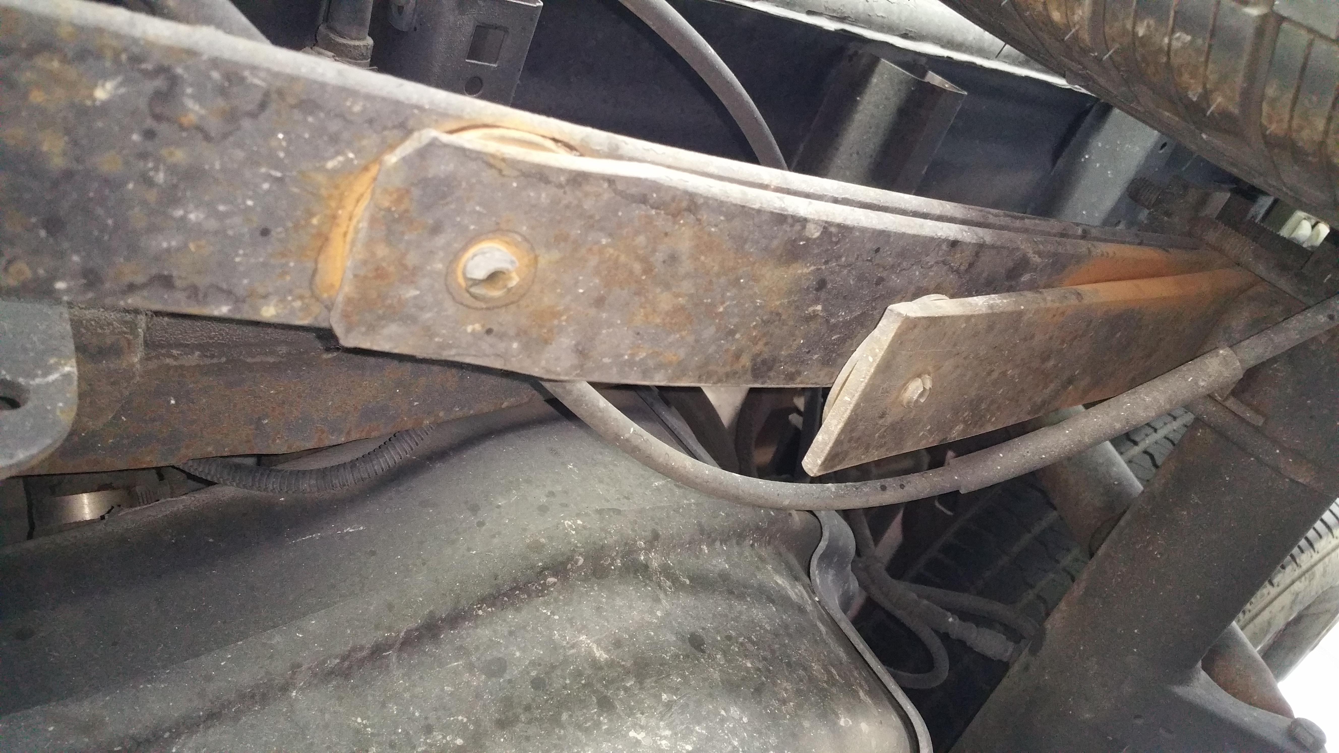 is this normal? crawled under the '98 F150 to bang on things and see