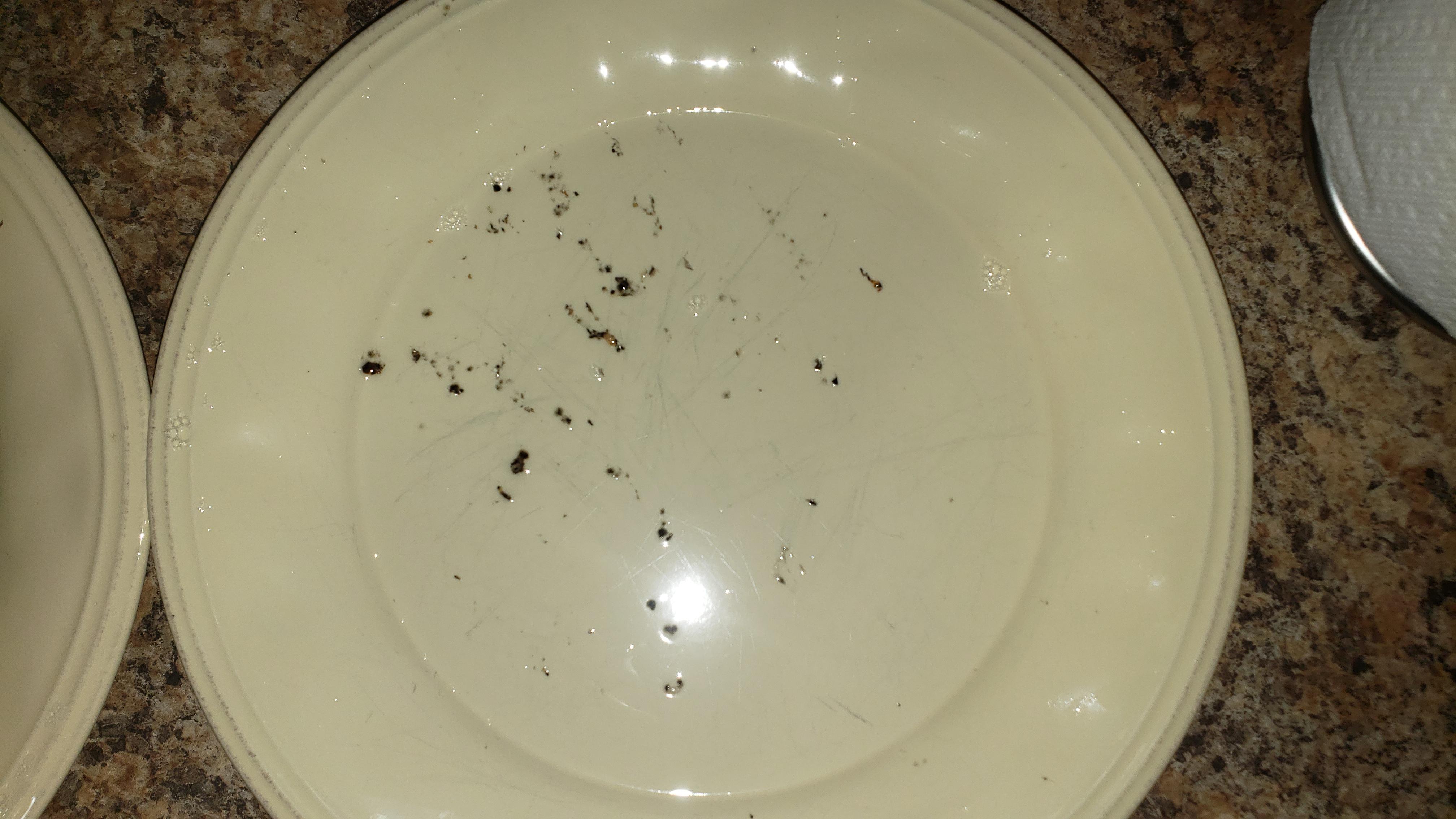 Dishwasher consistently leaves this blackish gunk on some things, what