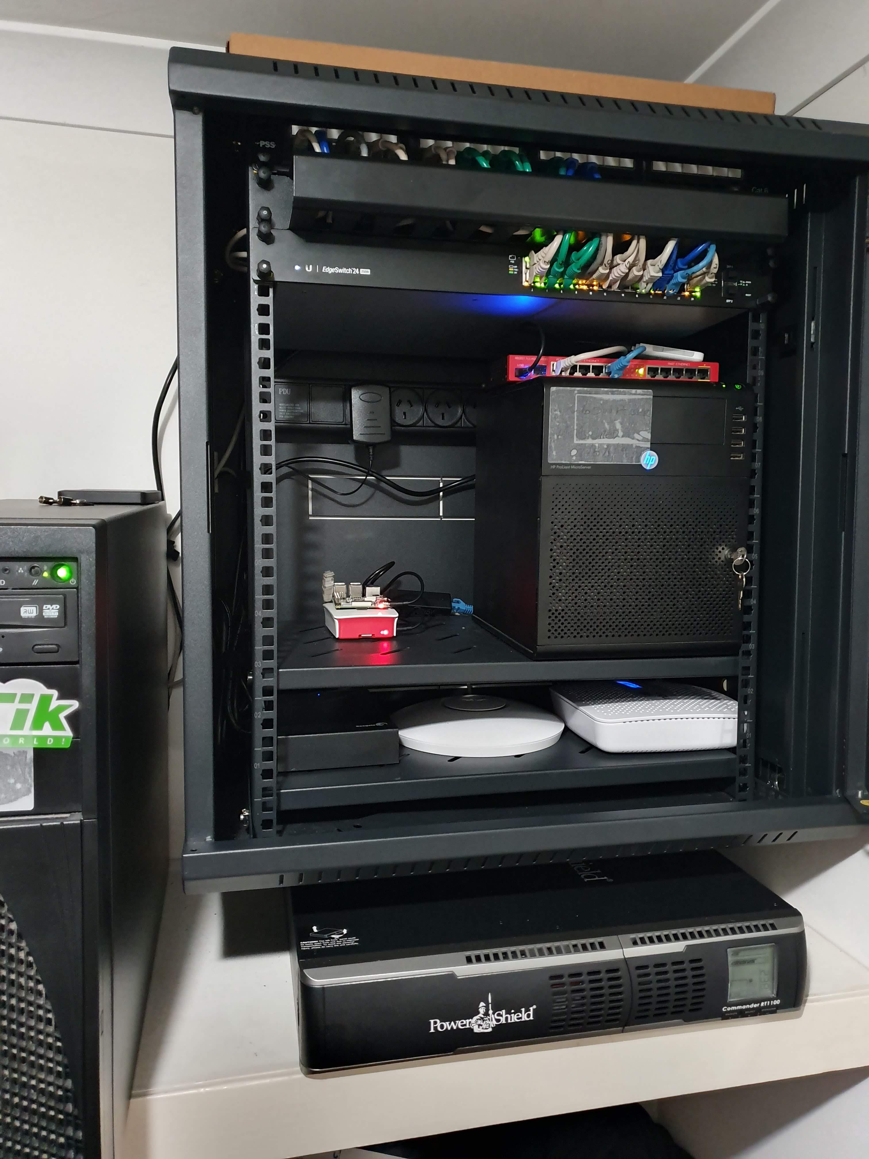 Just finished installing a new UPS and tidying up the rack r/homelab