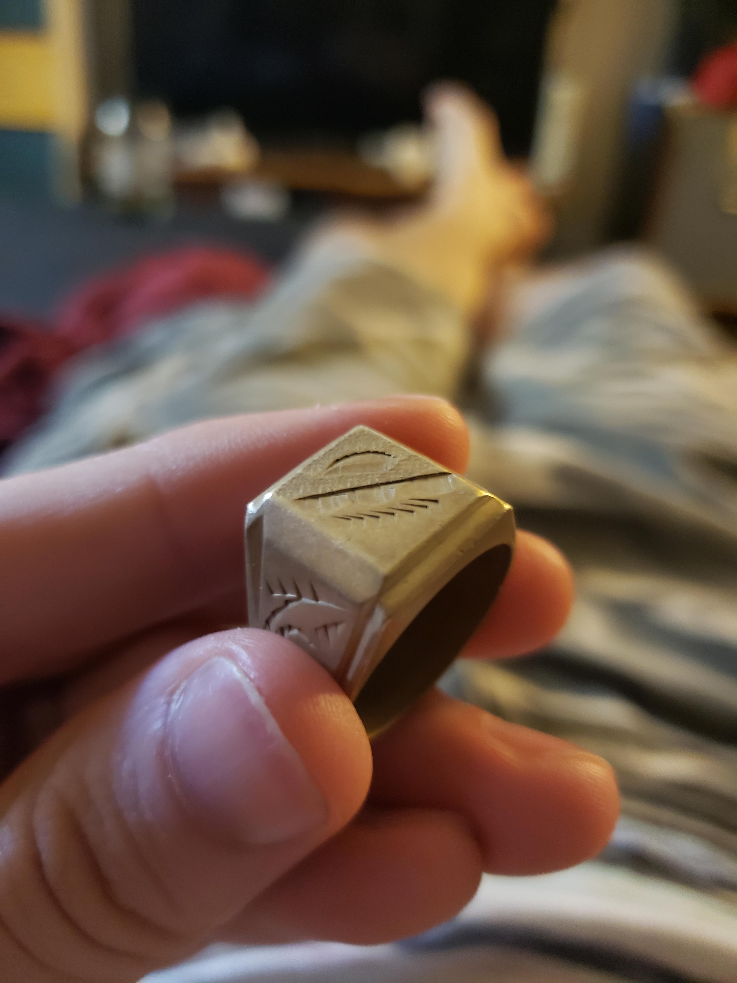 I've got this brass ring (not sure of the origin) and I can't seem to