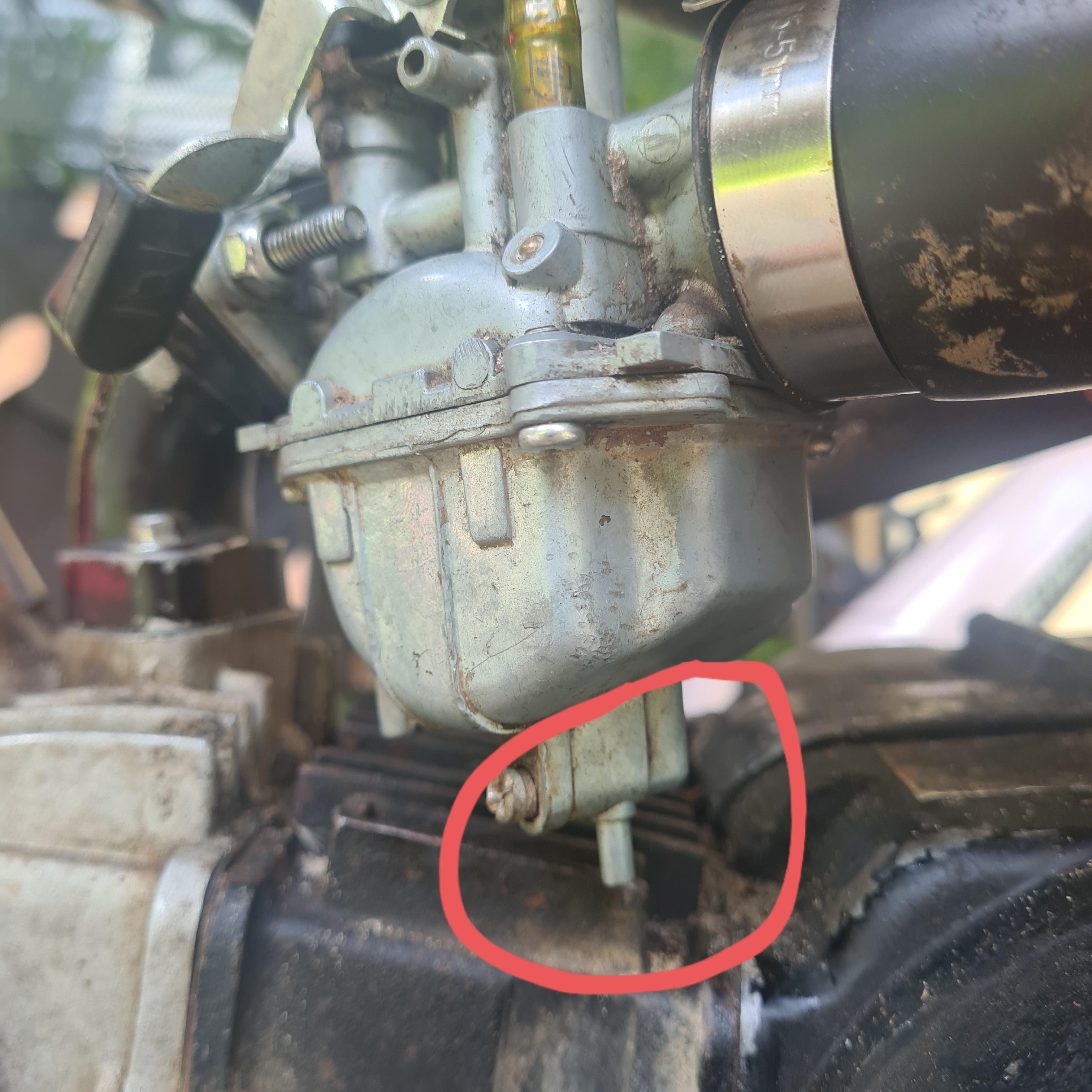 Fuel dripping out of bottom of carburettor. drain screw completely