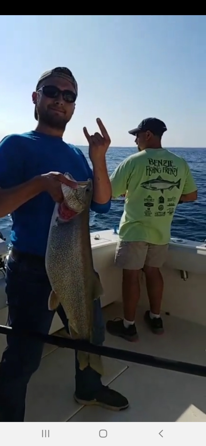 Me and my Lake Huron trout from 2018. Pretty tasty as well. r/Fishing