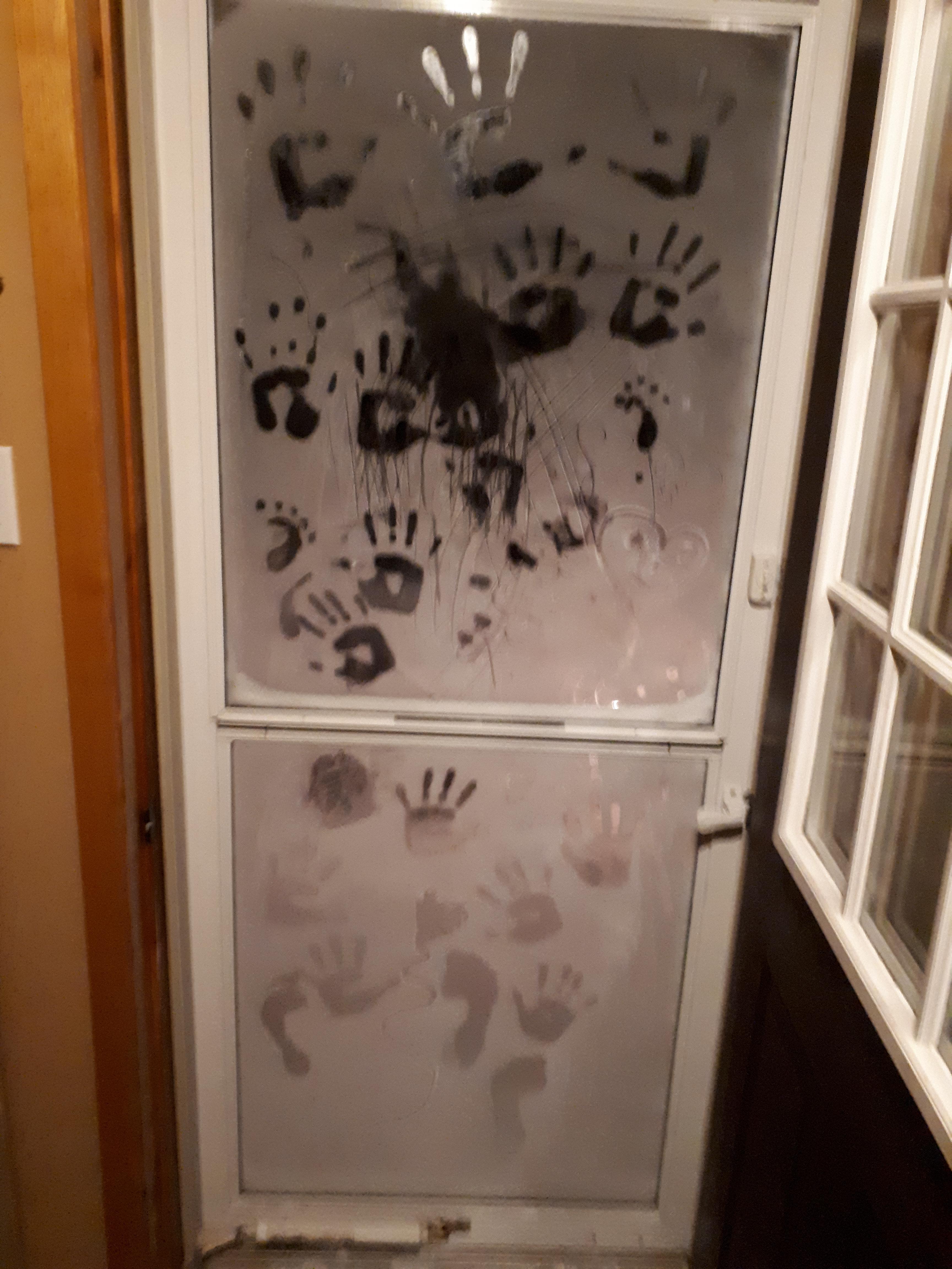 Bloody Handprint On Glass