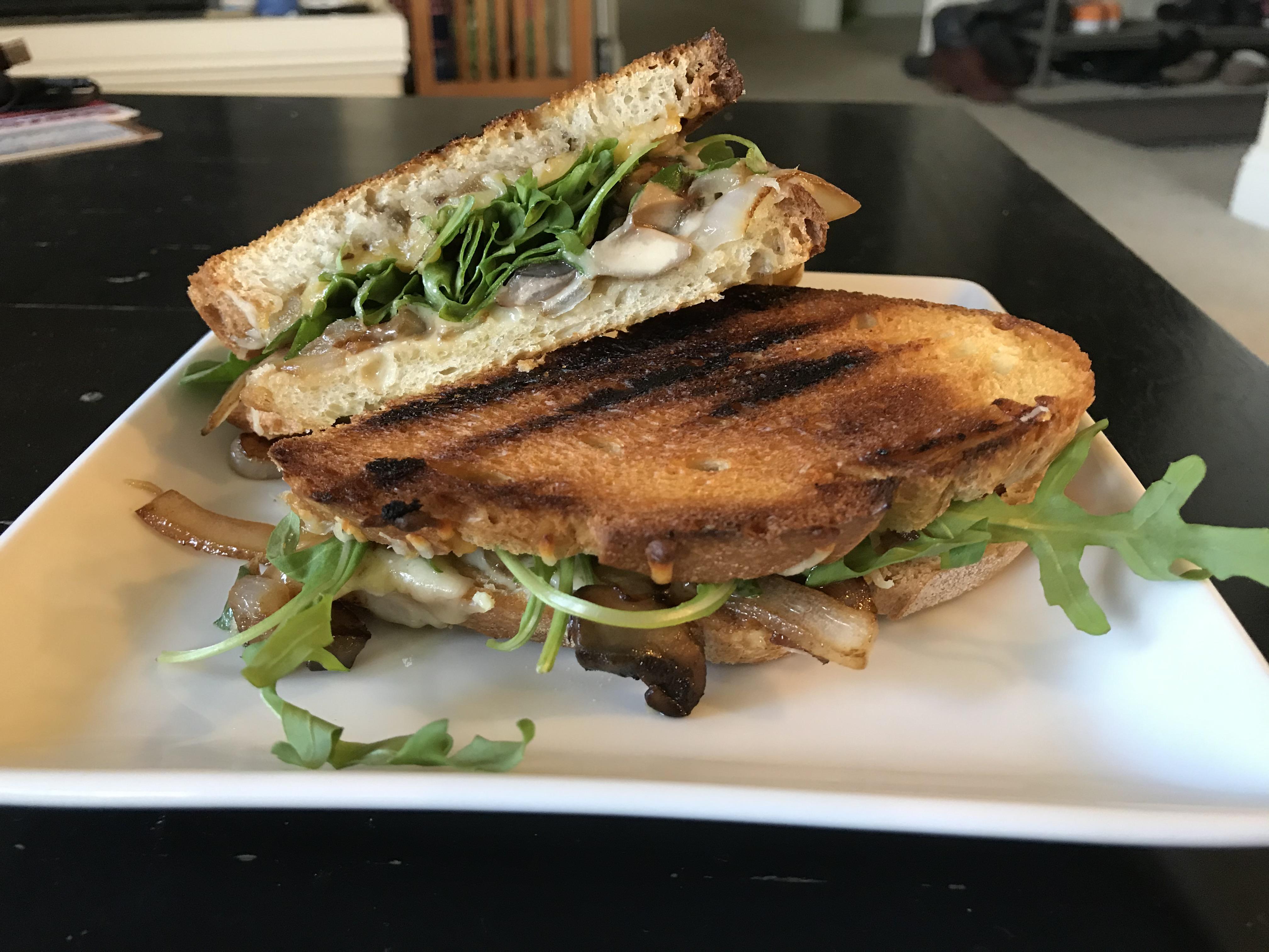 Adult grilled cheese manchego, white cheddar, carmelized onions