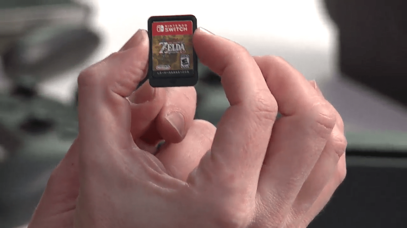 Nintendo Switch Game Card held r/NintendoSwitch