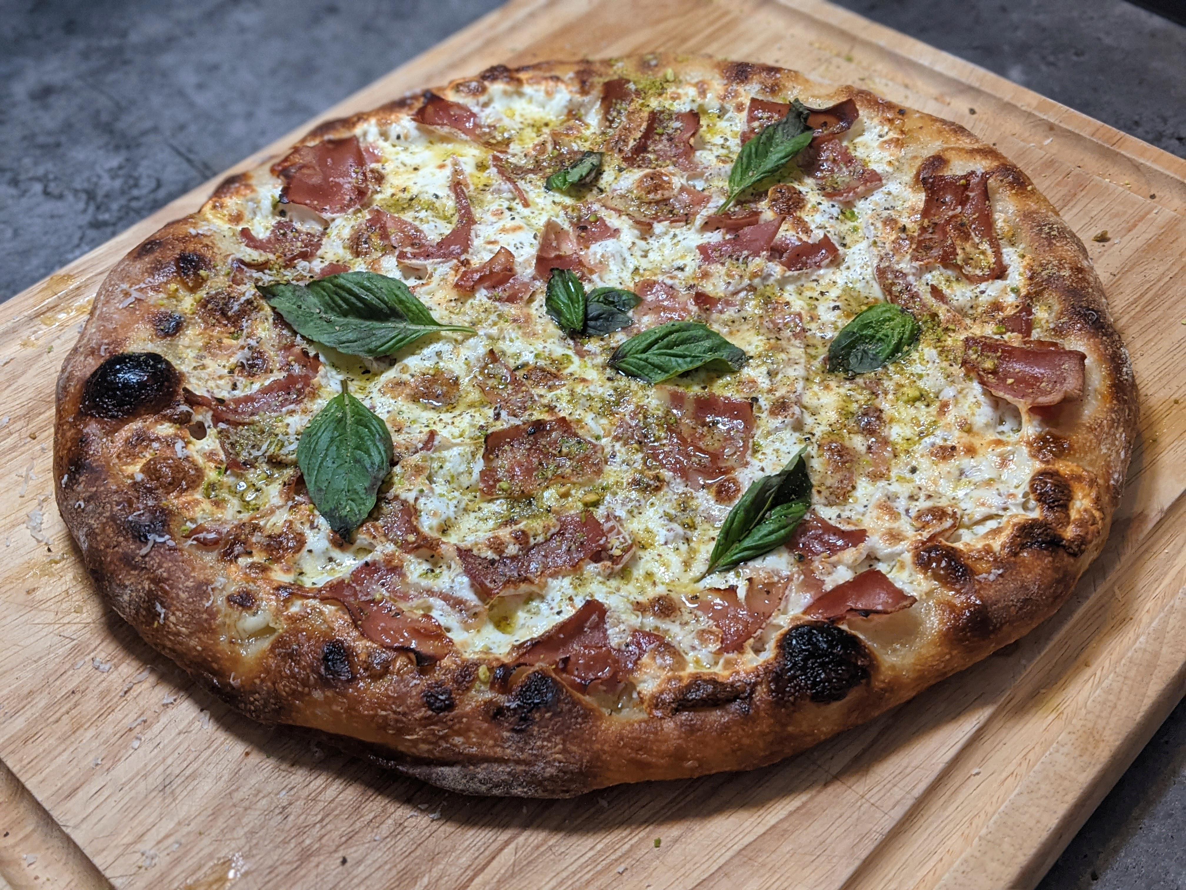 Homemade Mortadella with garlic and pistachio oil r/Pizza