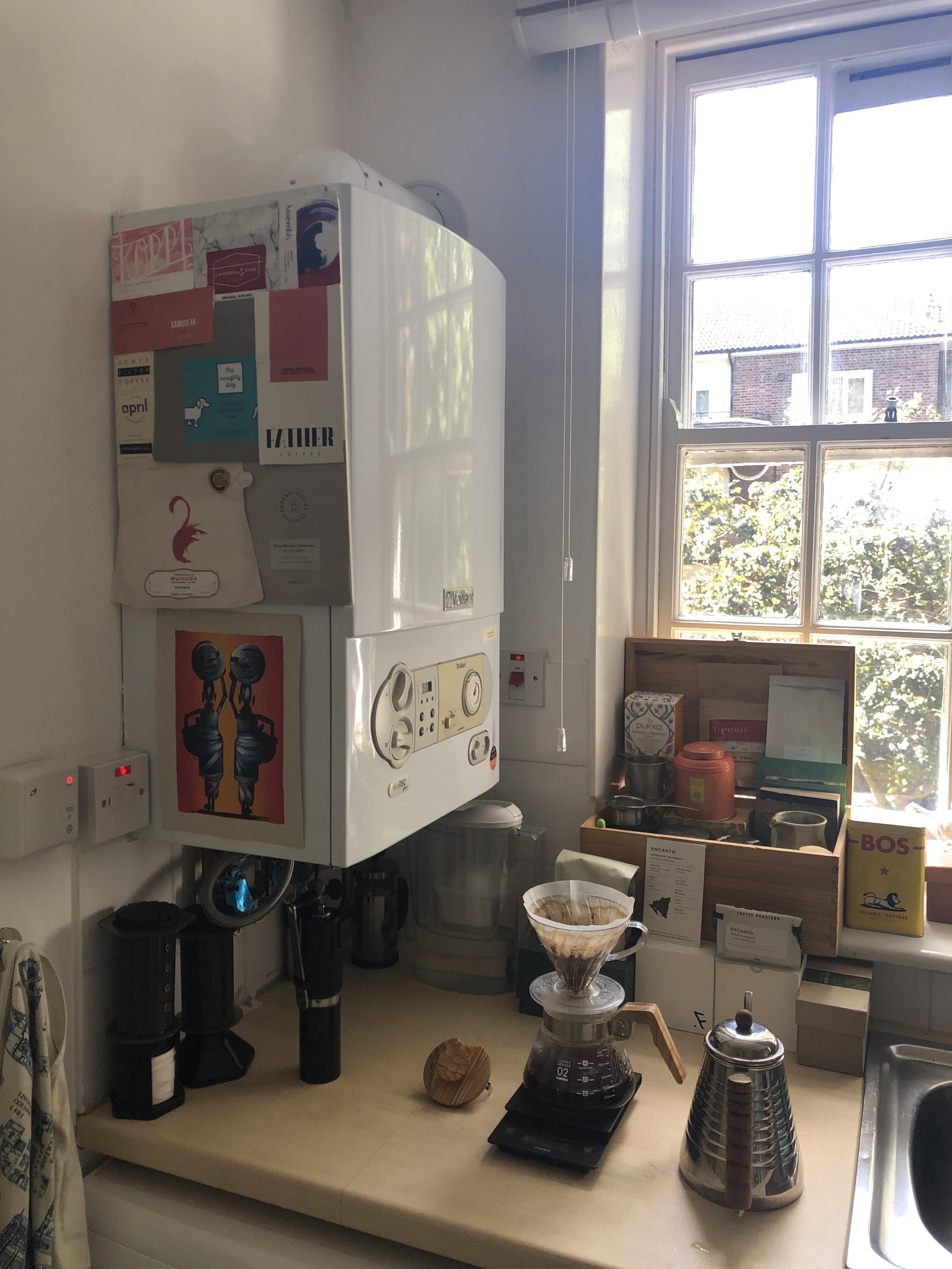 Coffee + tea station mid brew, complete with some coffee art r