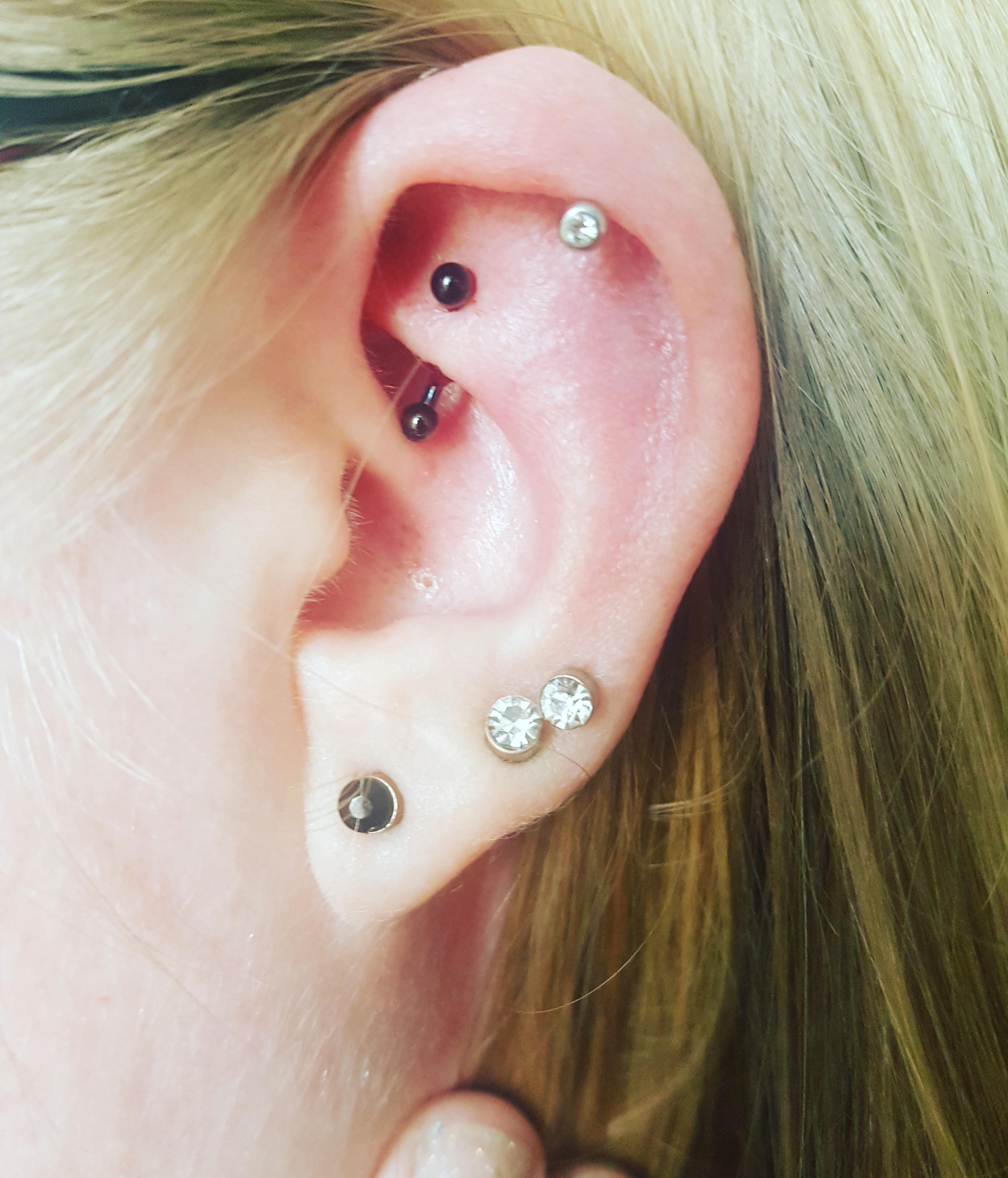 Brand new rook piercing! Now up to 16 piercings ^_^ r/piercing