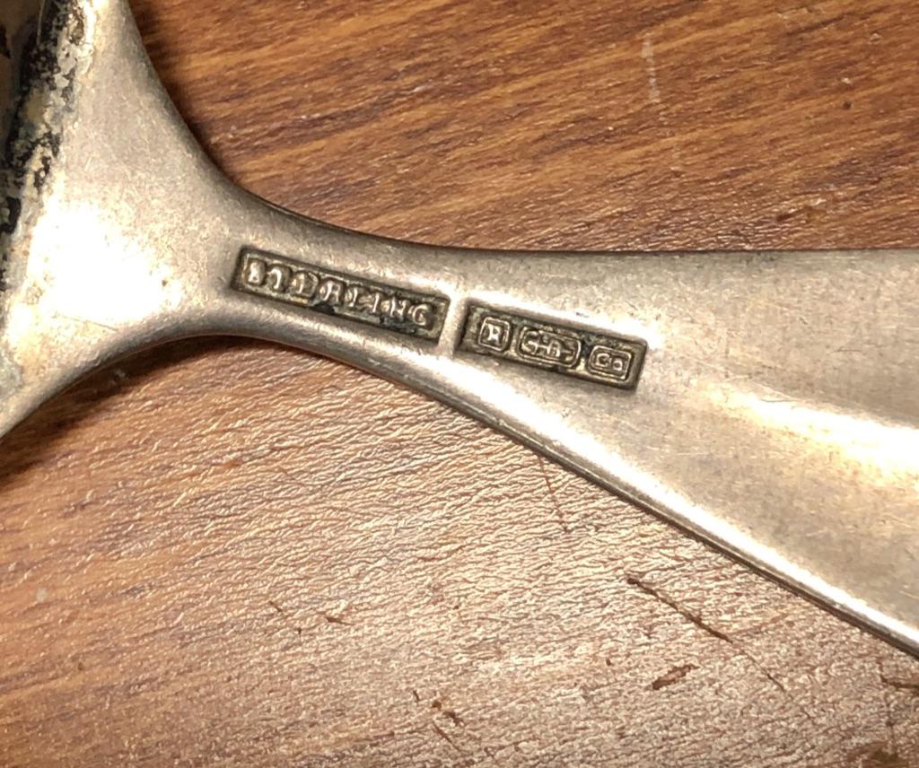 Please help me identify the maker on this sterling baby food pusher