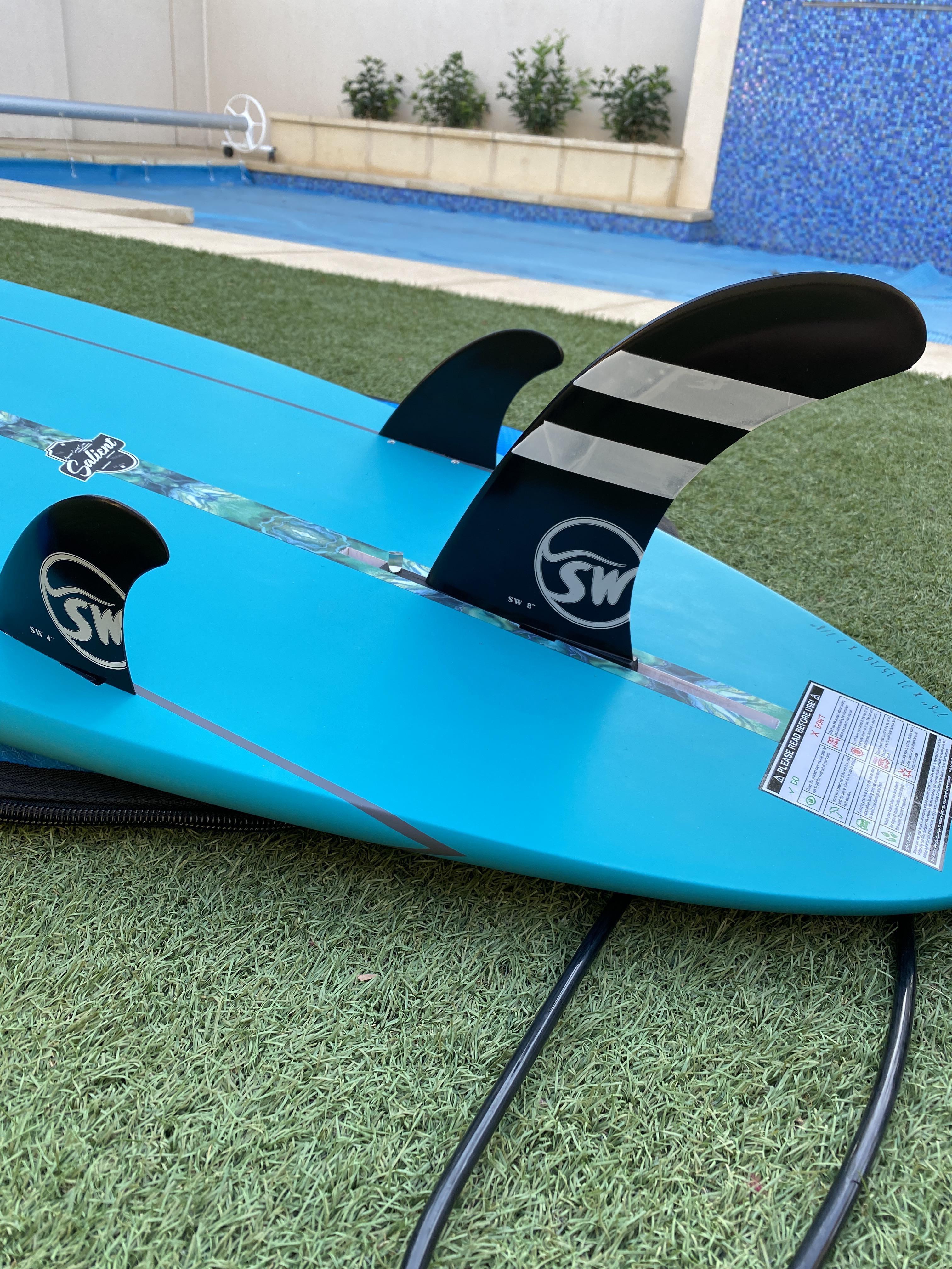 Single box fin + thrusters My mate recons this is ok to run, I thought