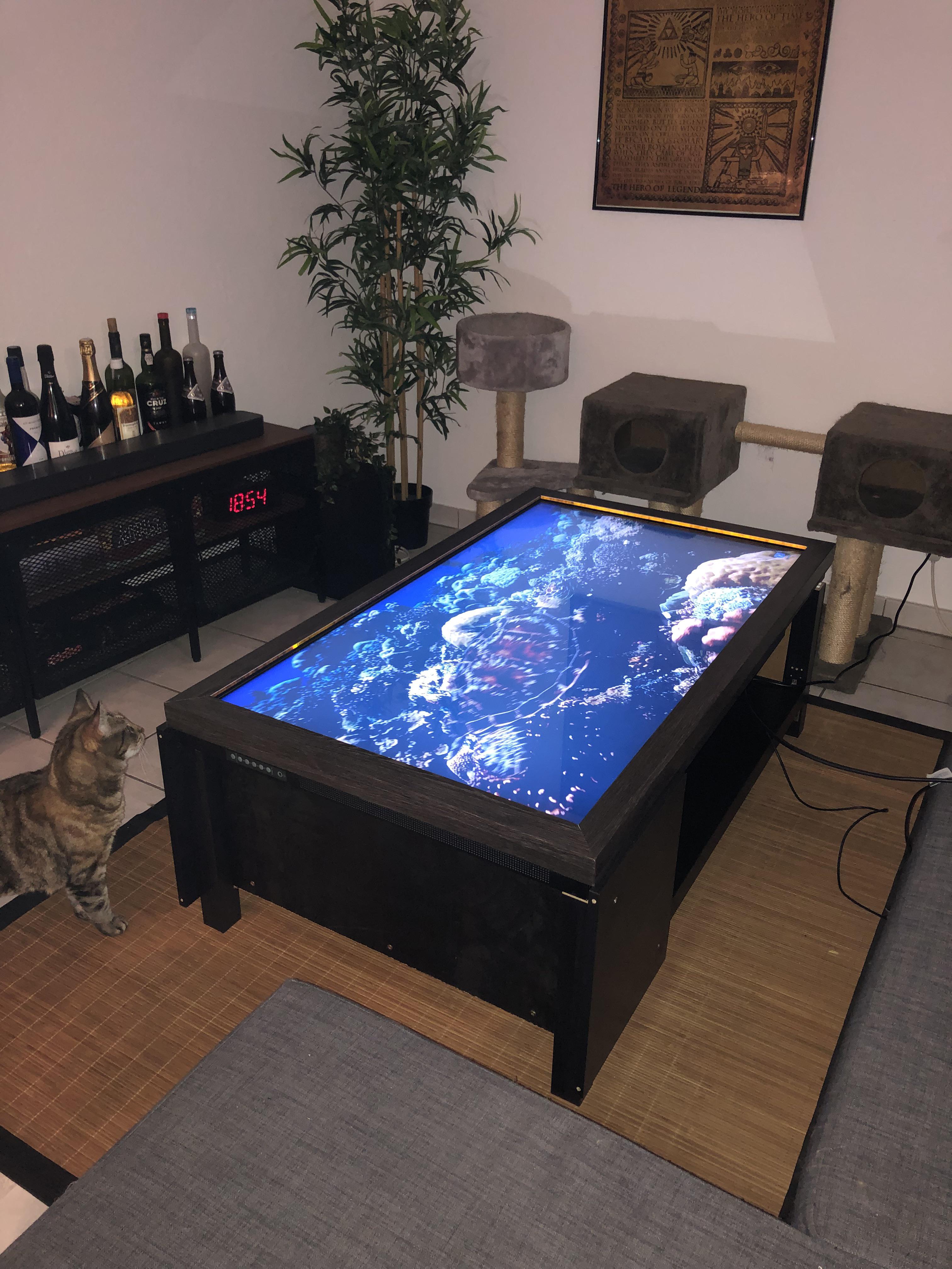 We made a table using a huge touchscreen monitor r/homelab
