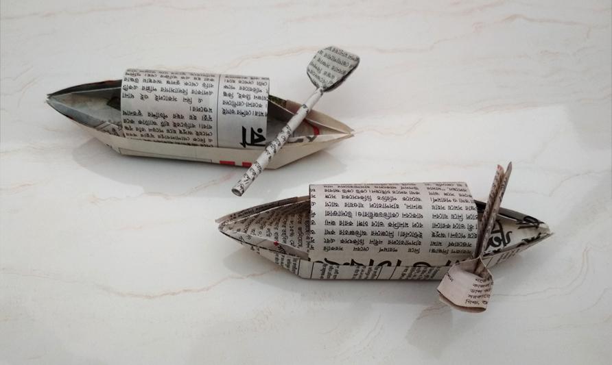 Newspaper boat made by me r/origami