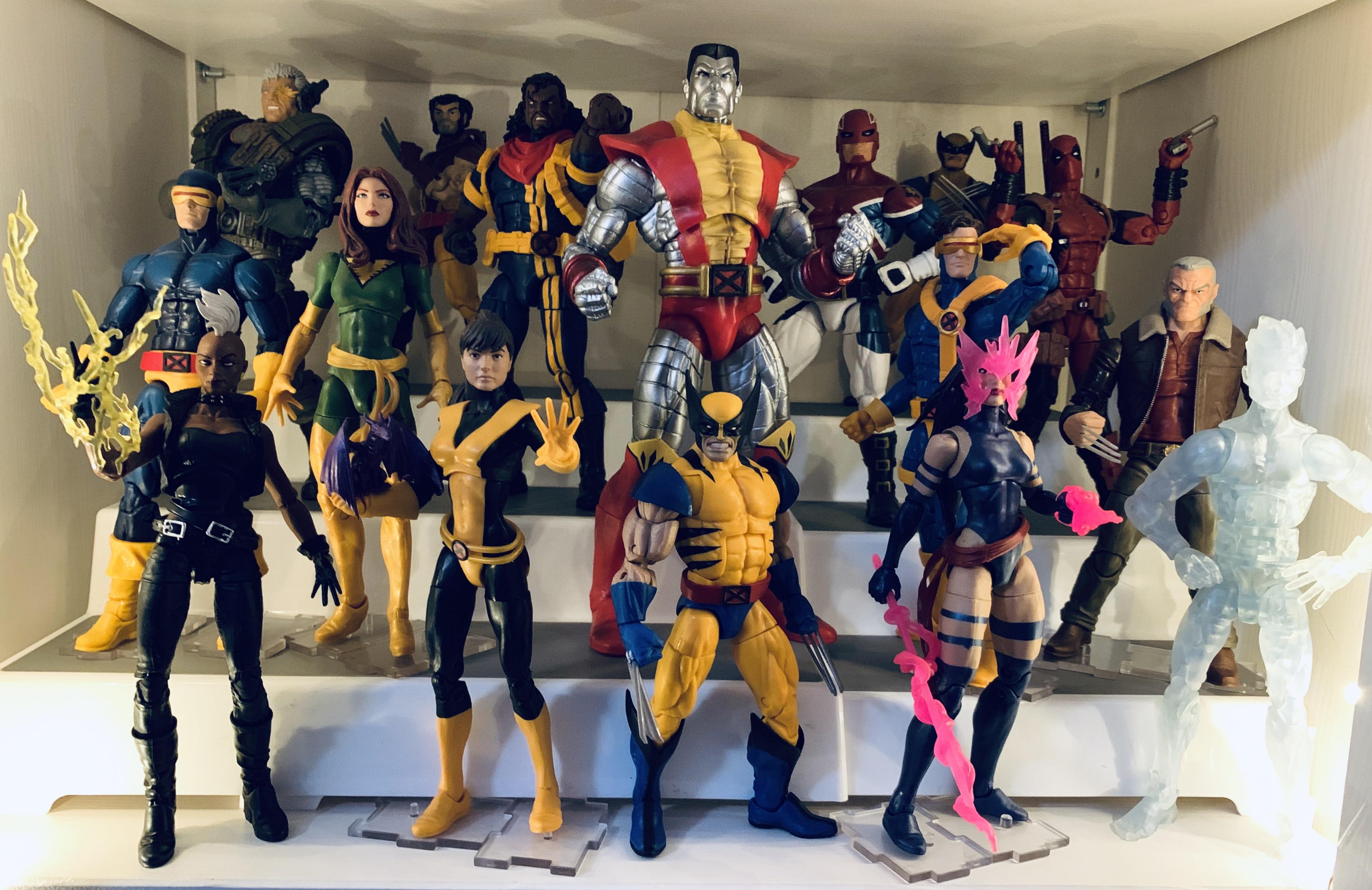 Cheap risers make a huge difference in bookshelf displays. r