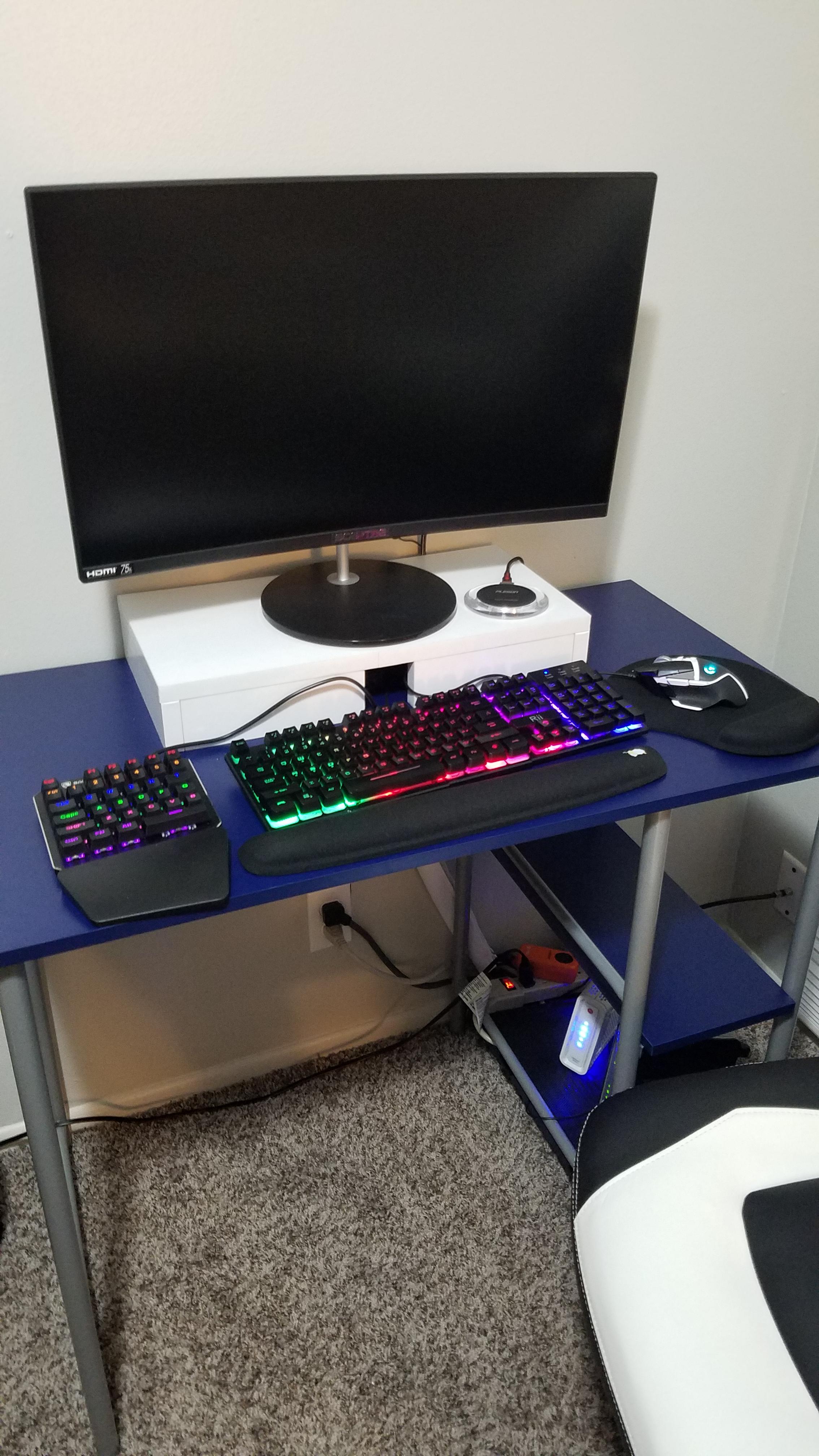 Enjoying my minimalist setup with my mini pc under the monitor stand