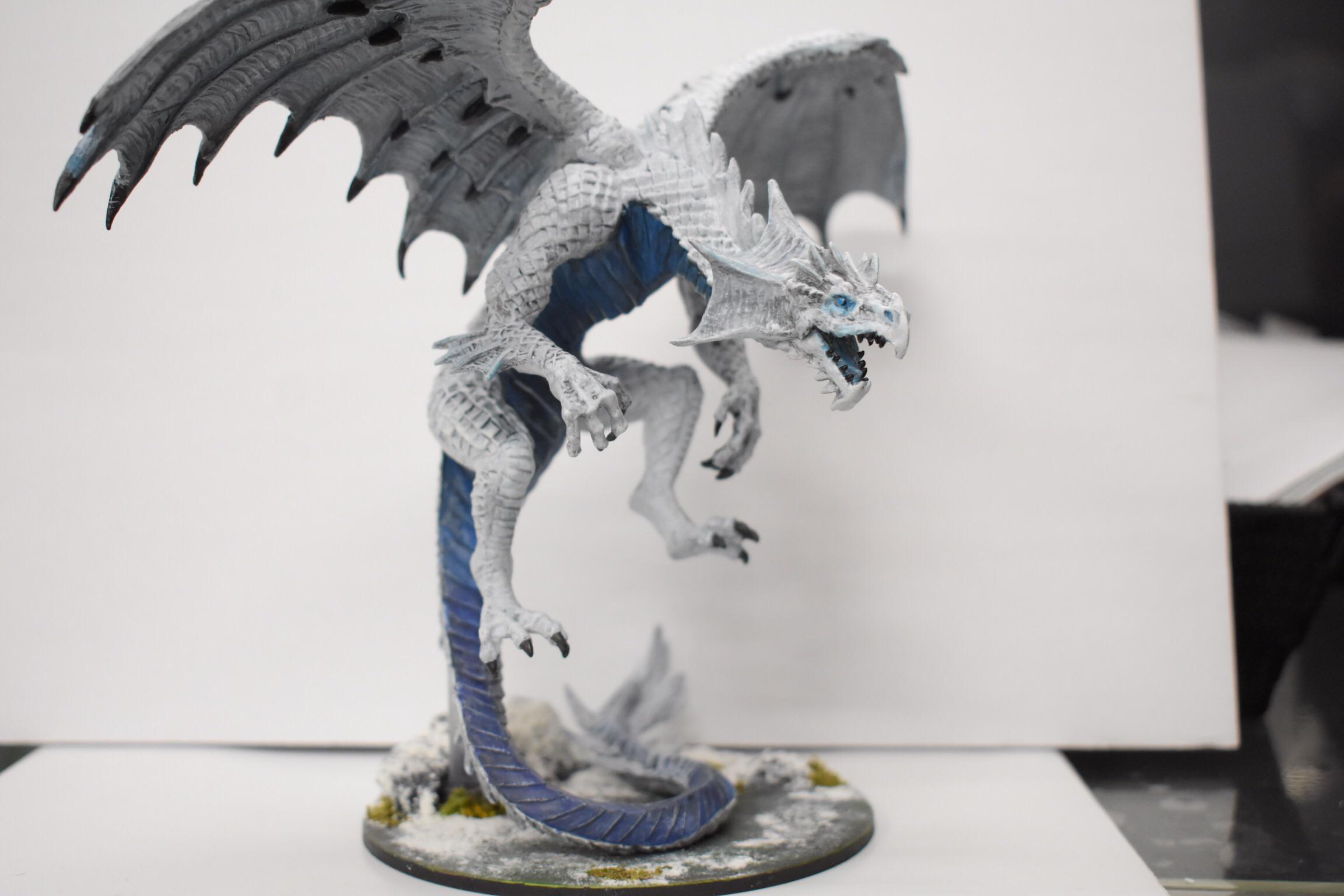 Finally finished and took a picture of my white dragon r/minipainting